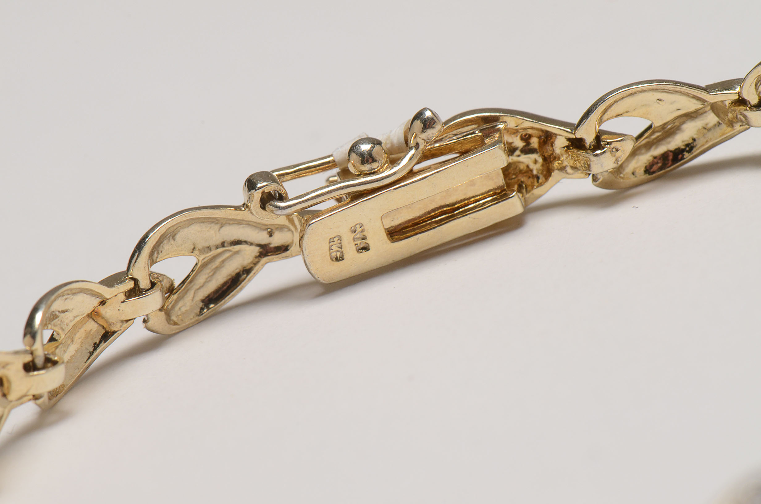 Three Sterling Vermeil Bracelets with Gemstones and Diamonds