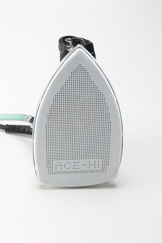 Pair of Clothes Irons and a Hanging Rack