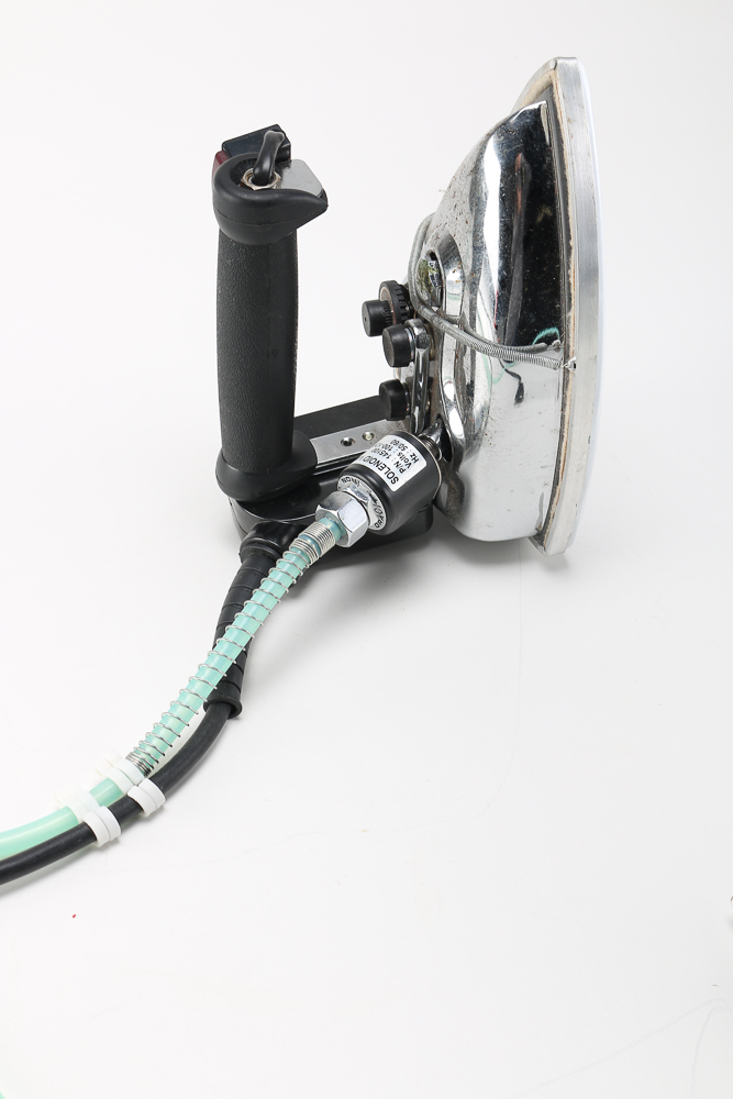 Pair of Clothes Irons and a Hanging Rack