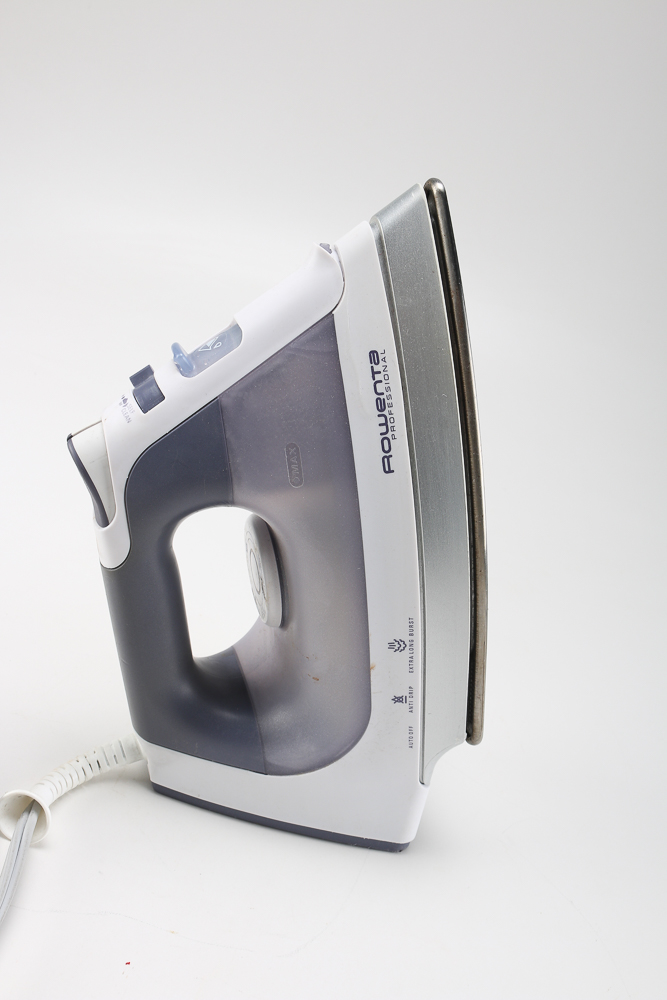 Pair of Clothes Irons and a Hanging Rack