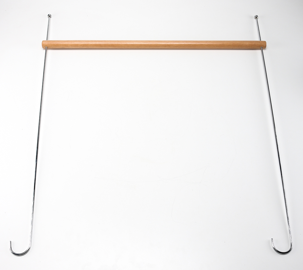 Pair of Clothes Irons and a Hanging Rack