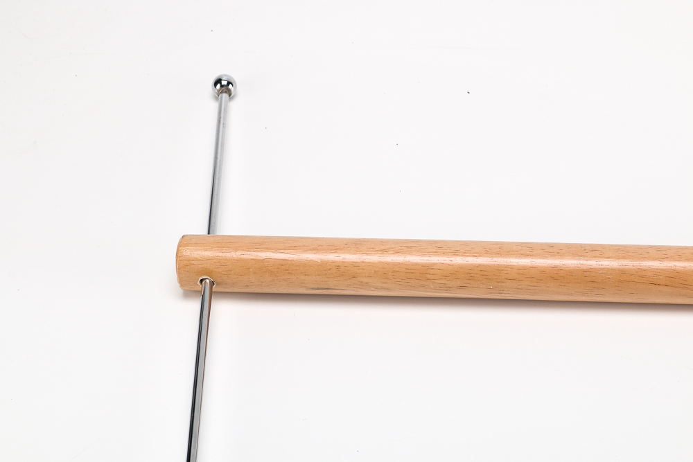 Pair of Clothes Irons and a Hanging Rack