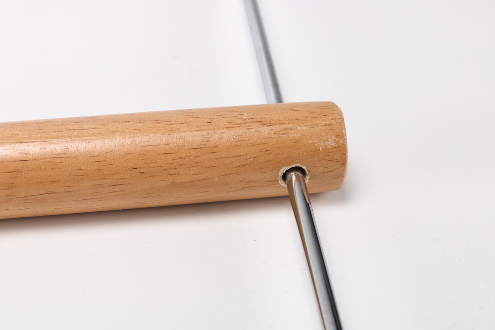 Pair of Clothes Irons and a Hanging Rack