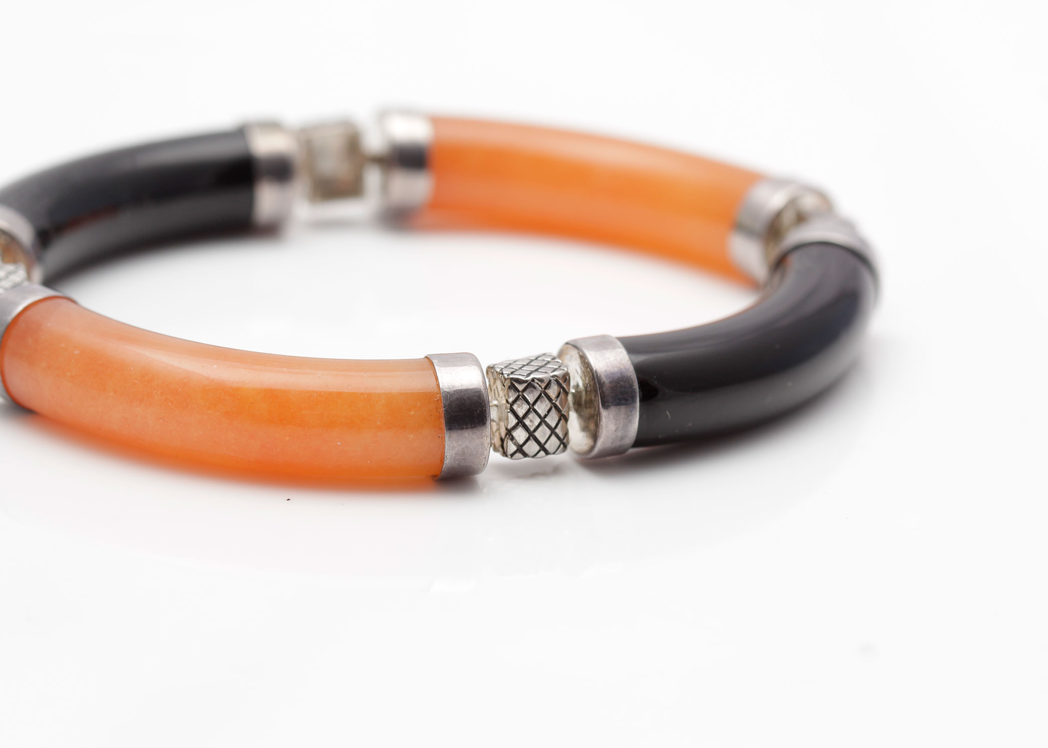 Sterling Silver Bracelet with Orange Jadeite and Black Onyx