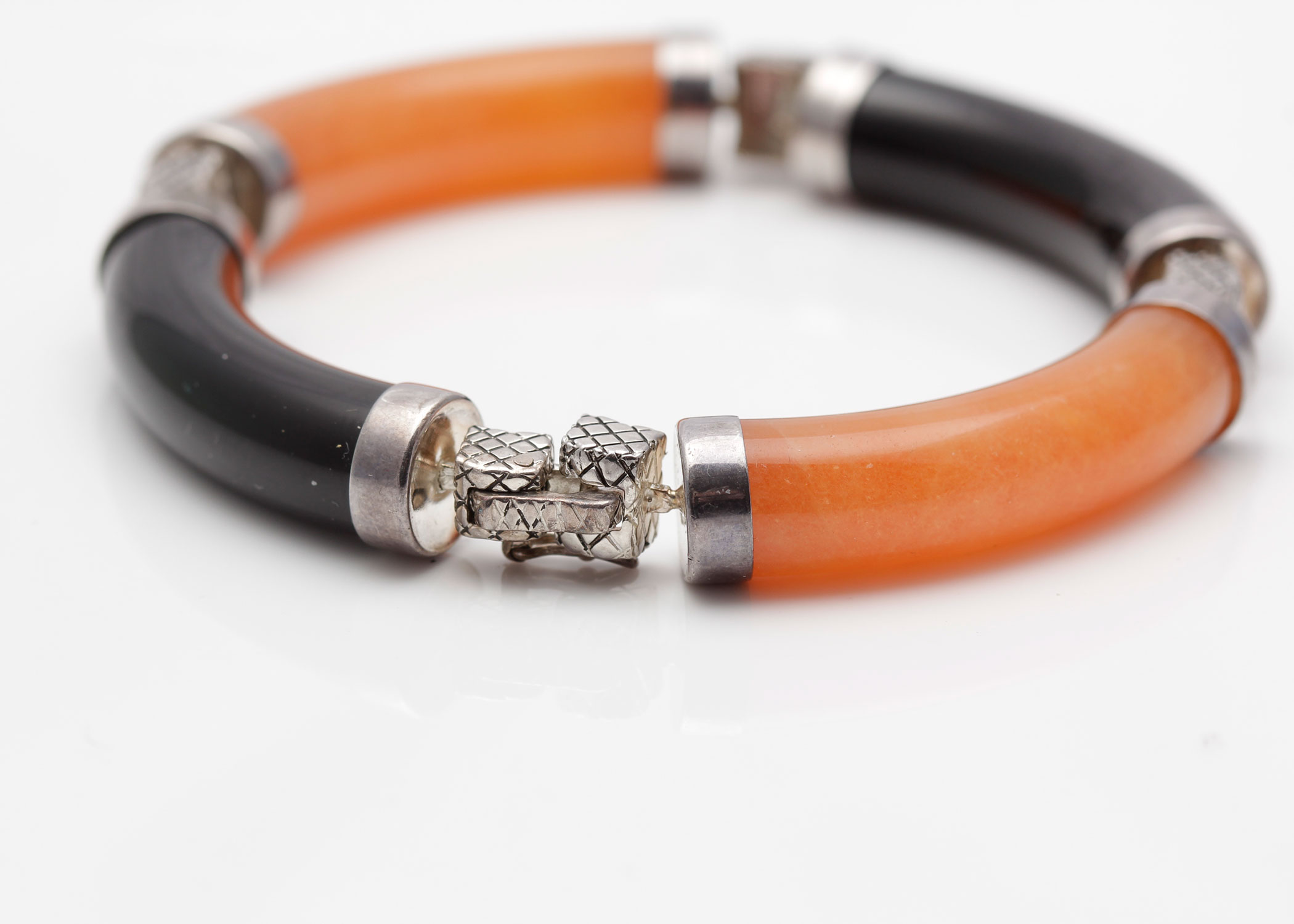 Sterling Silver Bracelet with Orange Jadeite and Black Onyx