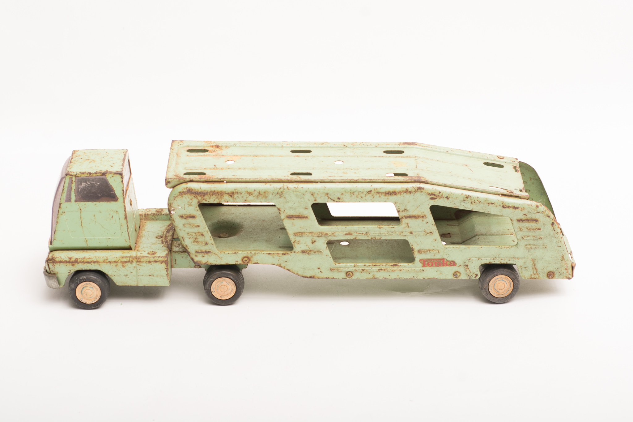 A Collection of Vintage Tonka Trucks