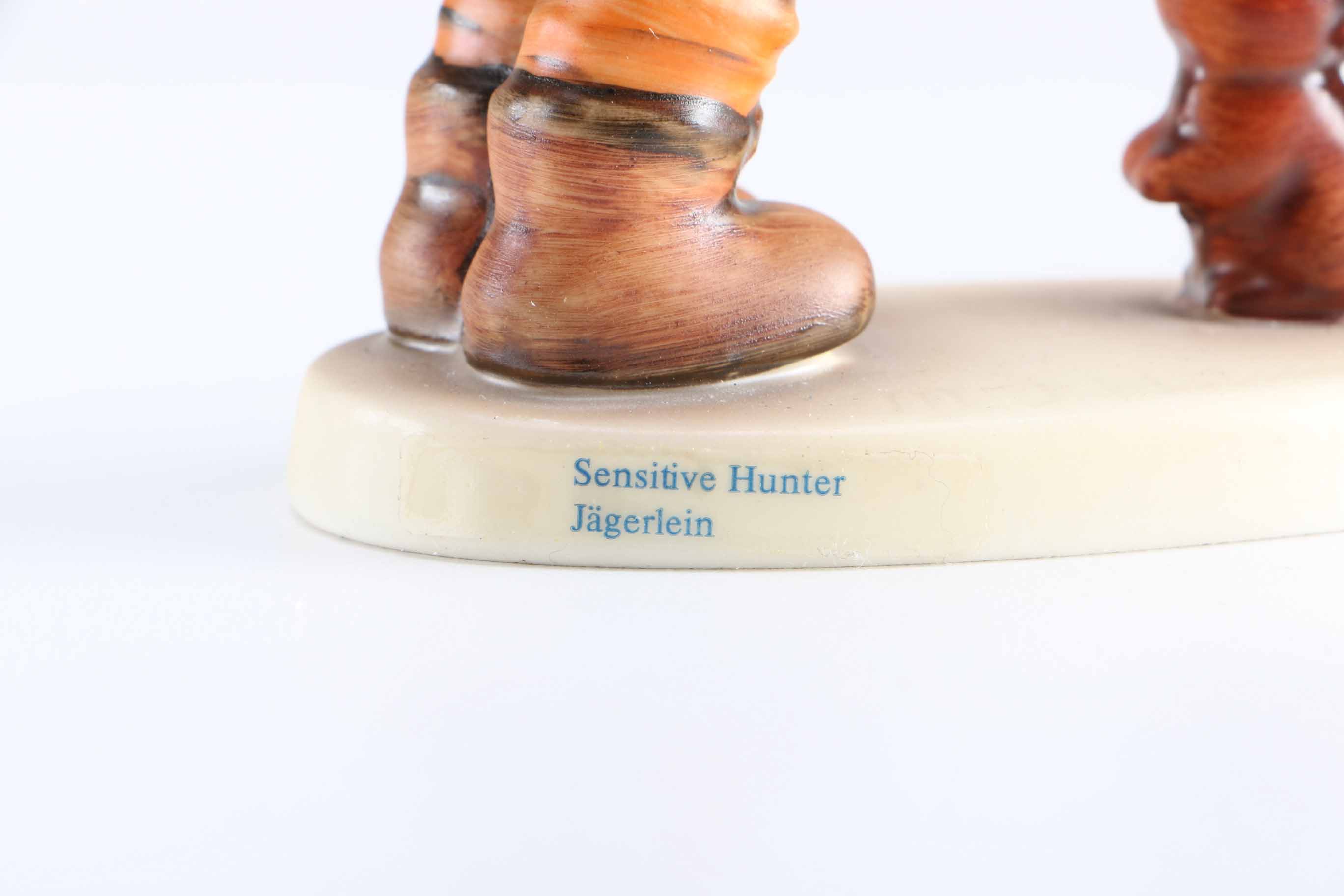 Pair of Hummel Porcelain Figurines "Sensitive Hunter" and "Playmates"