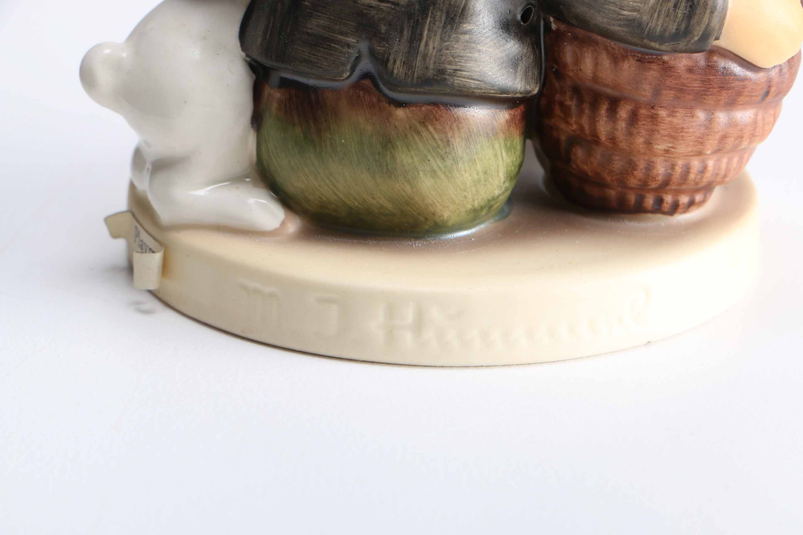 Pair of Hummel Porcelain Figurines "Sensitive Hunter" and "Playmates"