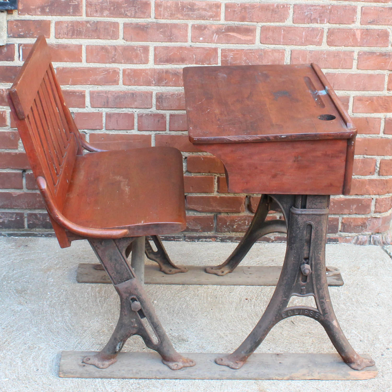 Eclipse Antique Cherry and Cast Iron School Desk By The Theodor Kundtz Company