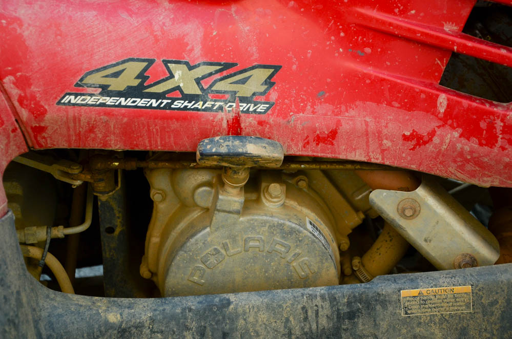 Red Polaris Sportsman 500 4x4 ATV, Tow-Behind Trailer, Snow Plow