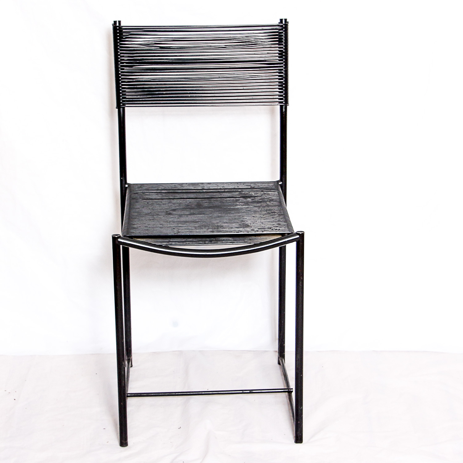 Two Black Metal Frame Chairs with Rubber Cord Seats