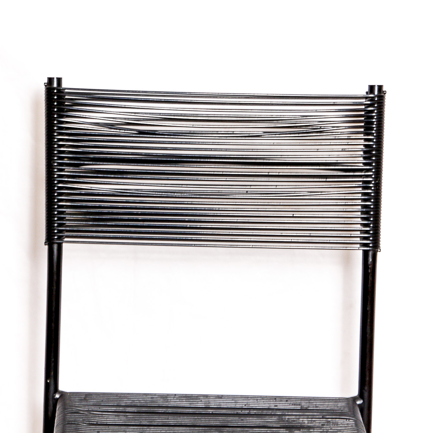 Two Black Metal Frame Chairs with Rubber Cord Seats