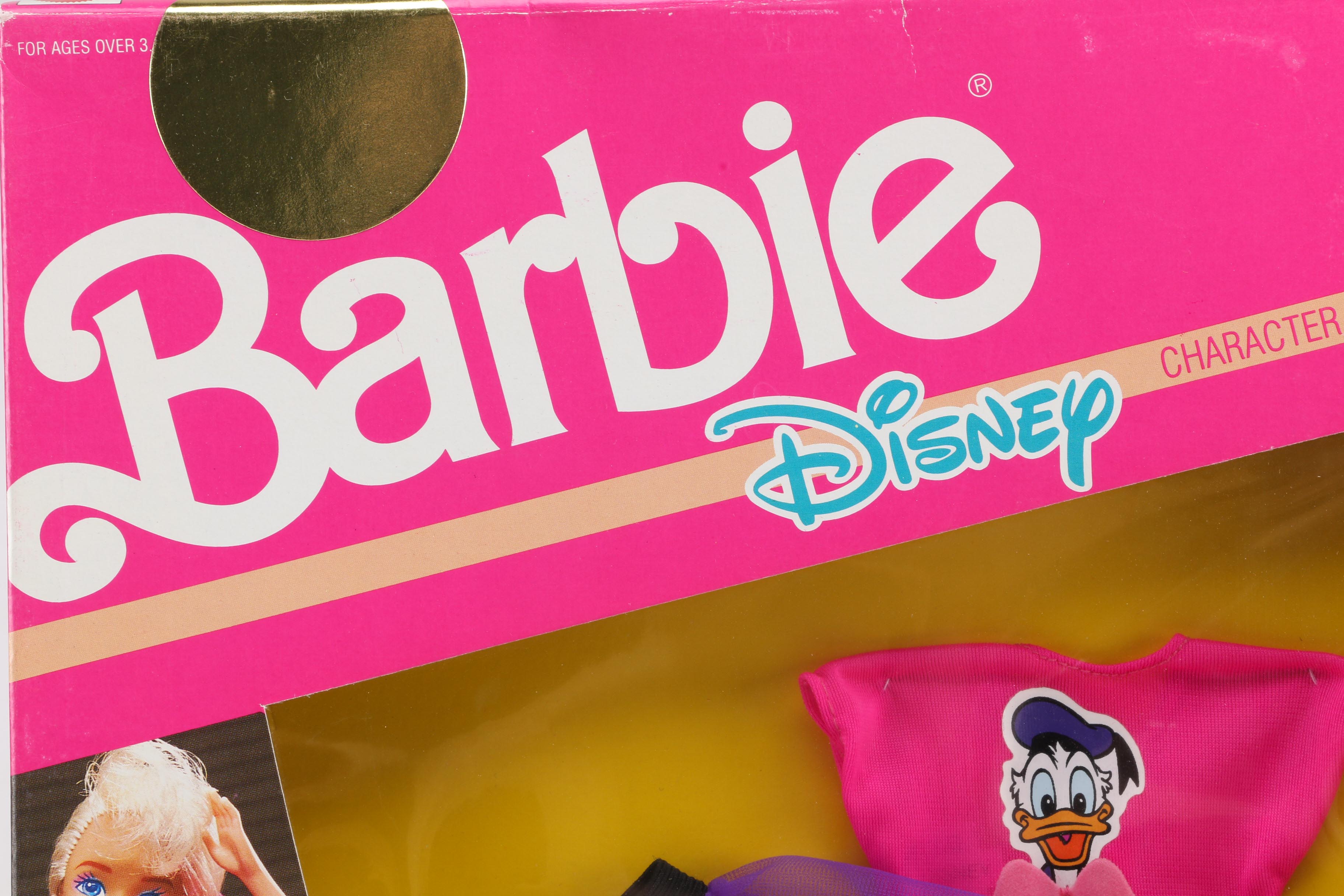 Collection of Barbie Dolls Disney Themed Clothing