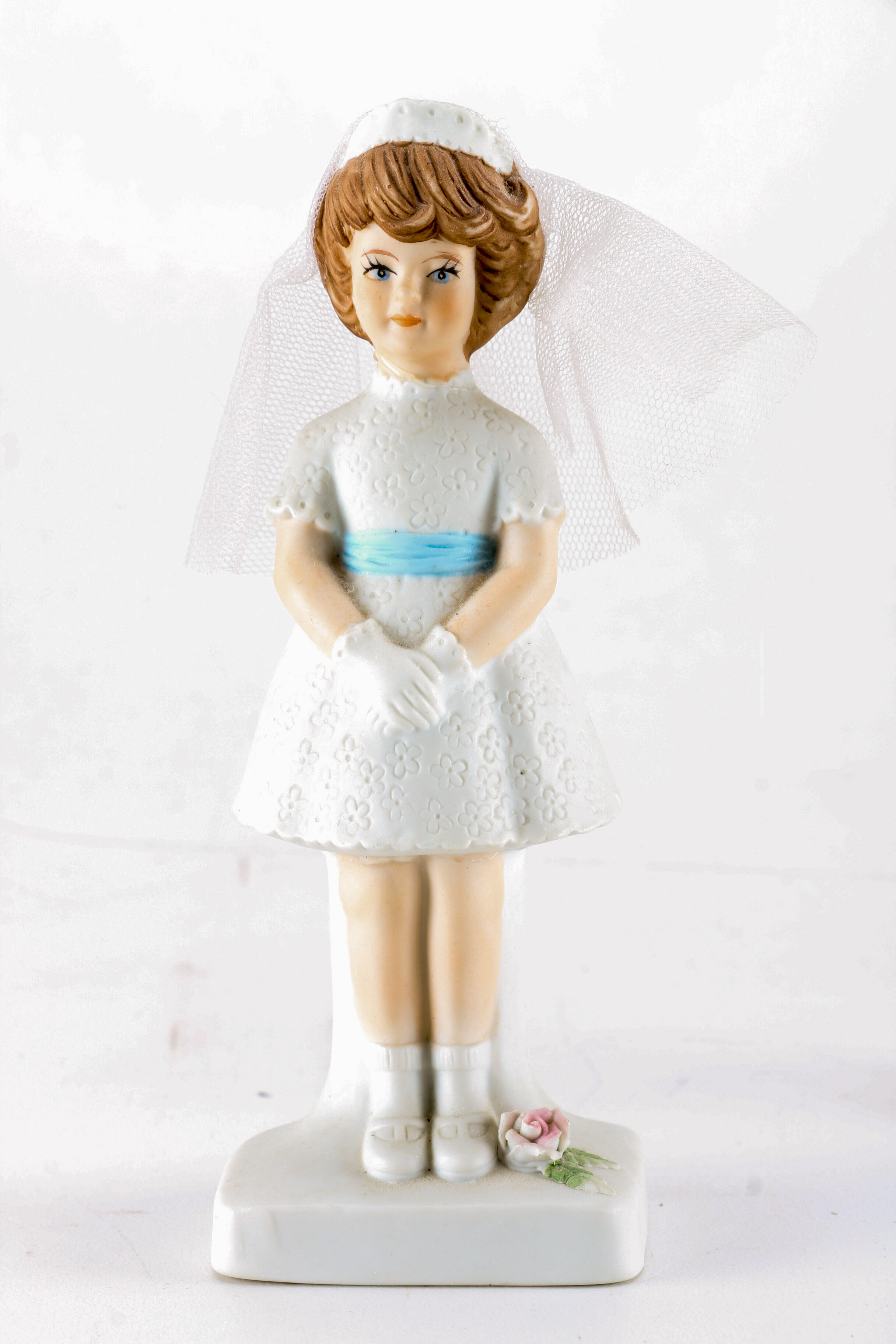Figurines from Enesco, Madam Alexander, and Almost Angels