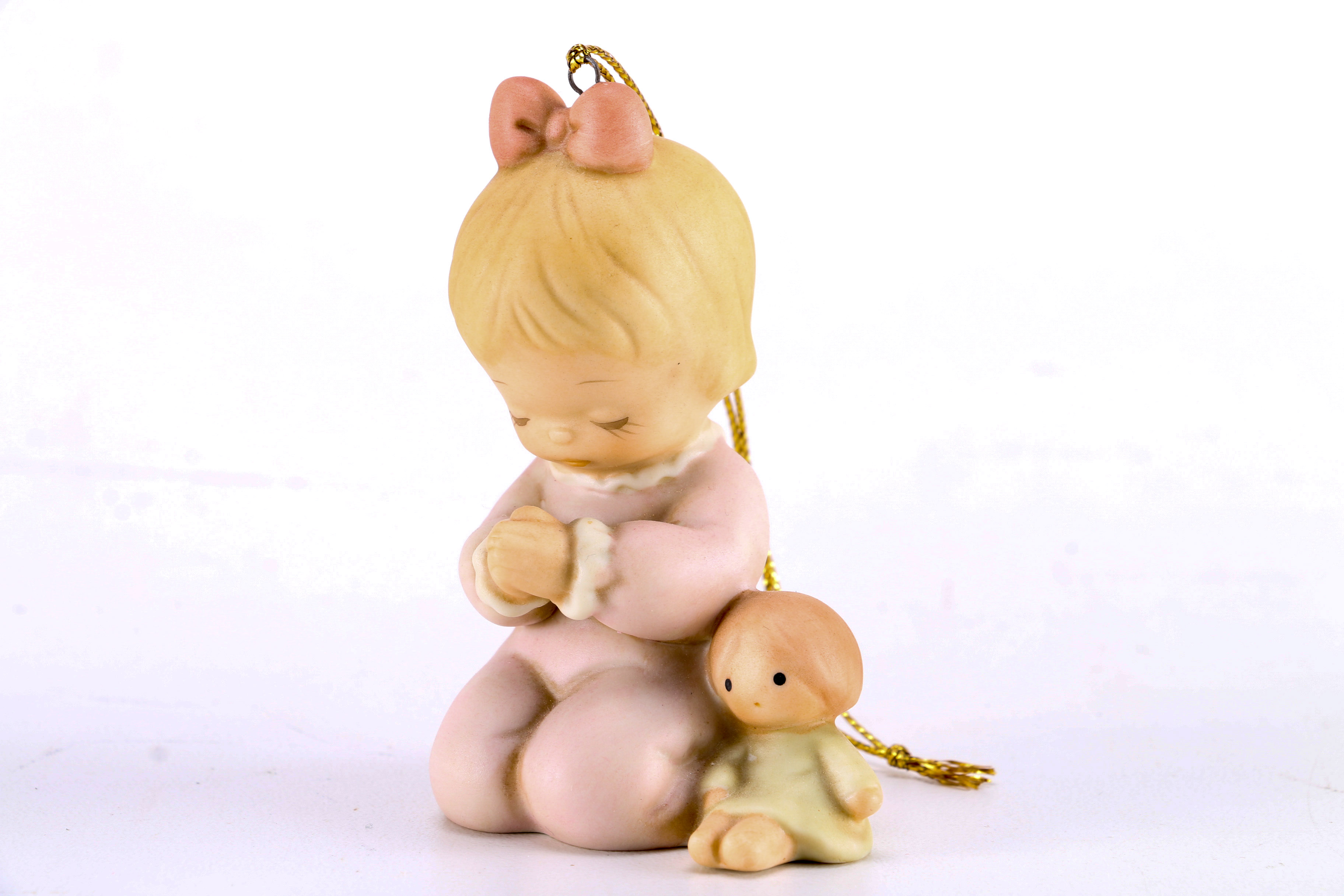 Figurines from Enesco, Madam Alexander, and Almost Angels