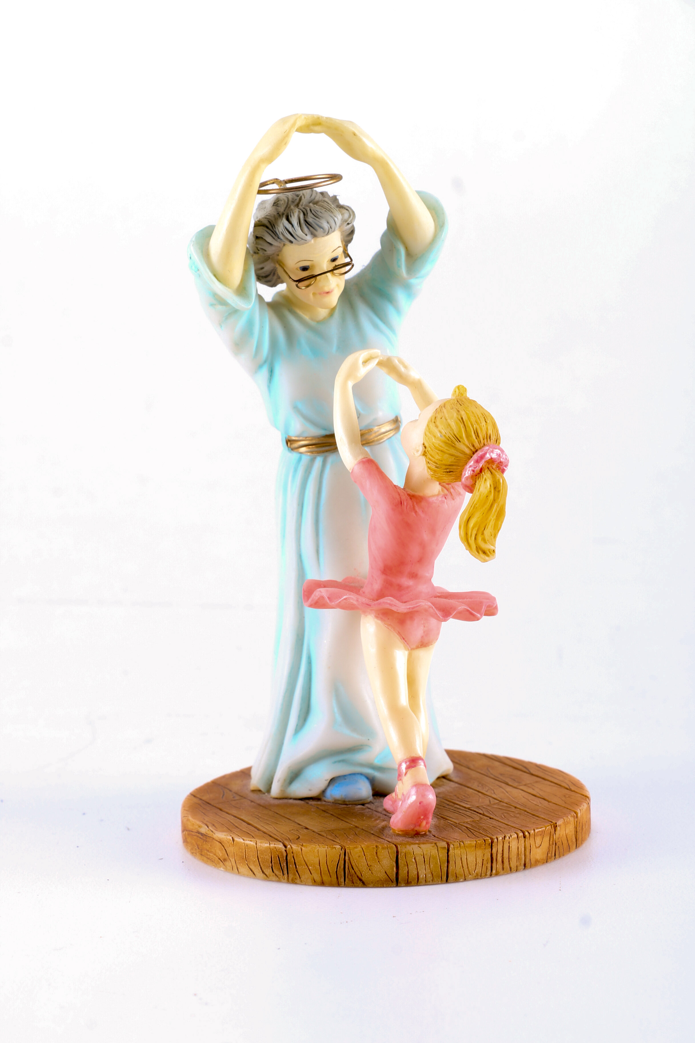 Figurines from Enesco, Madam Alexander, and Almost Angels