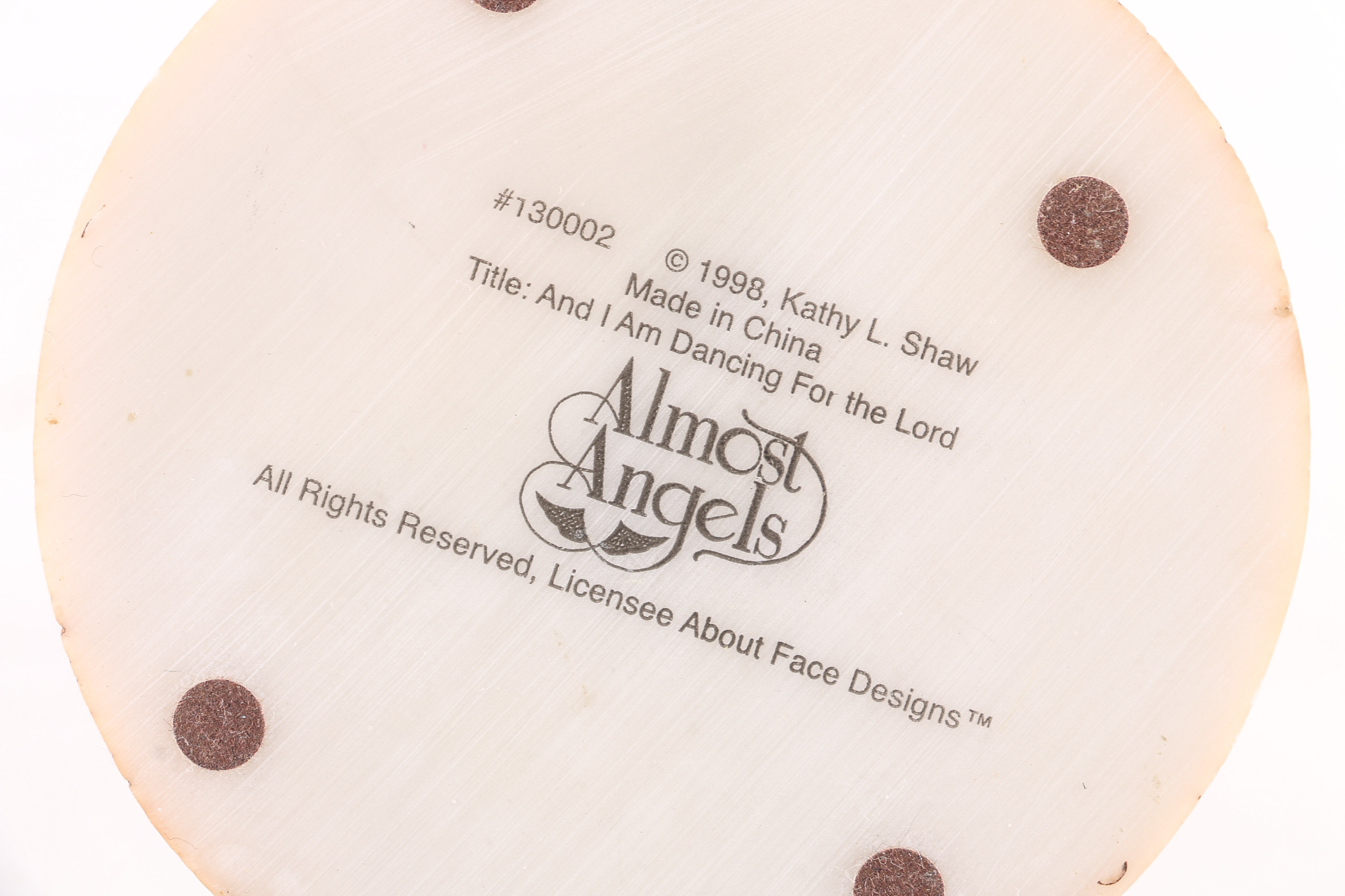 Figurines from Enesco, Madam Alexander, and Almost Angels