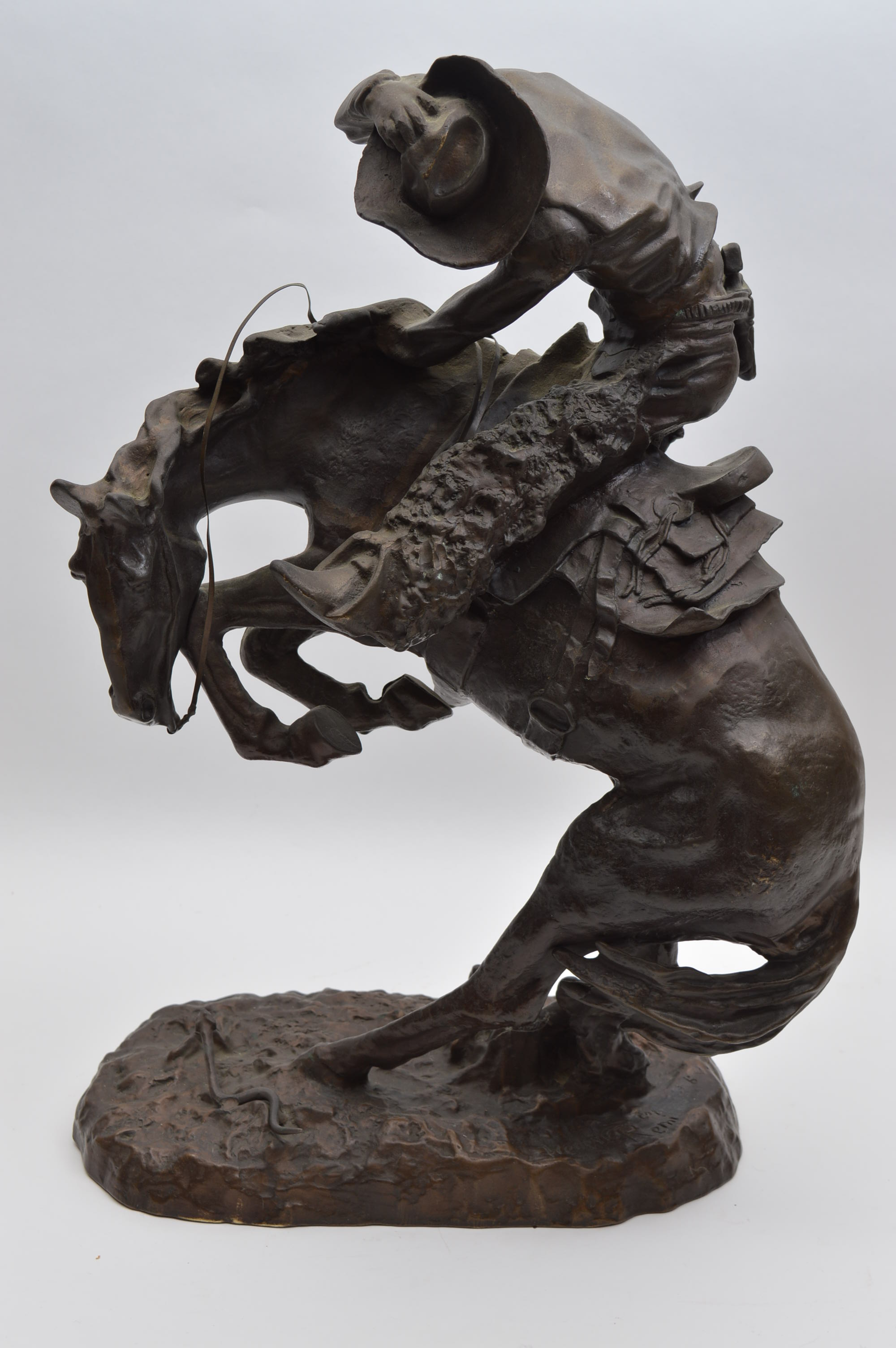 Bronze Cowboy Statue