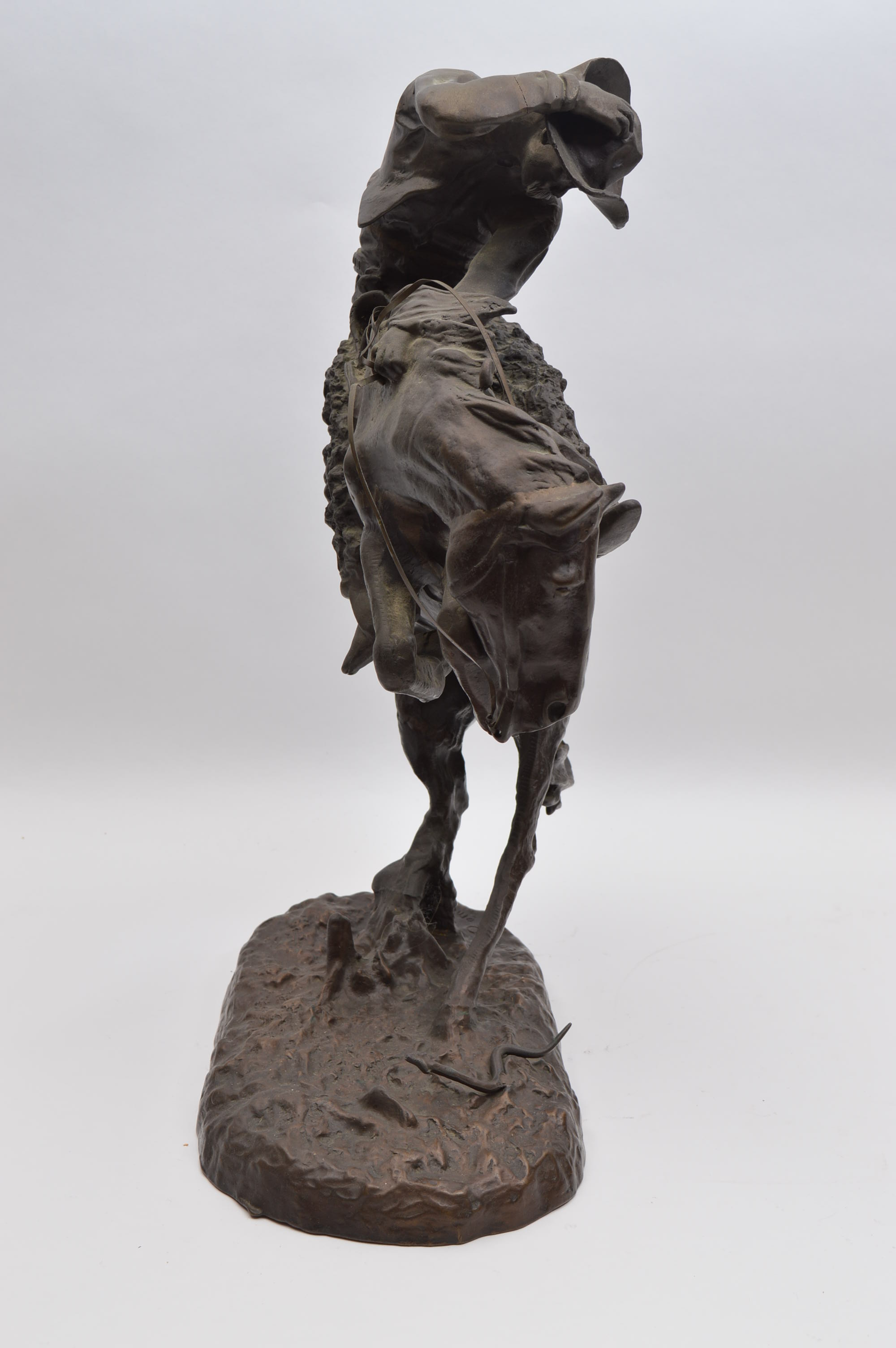 Bronze Cowboy Statue