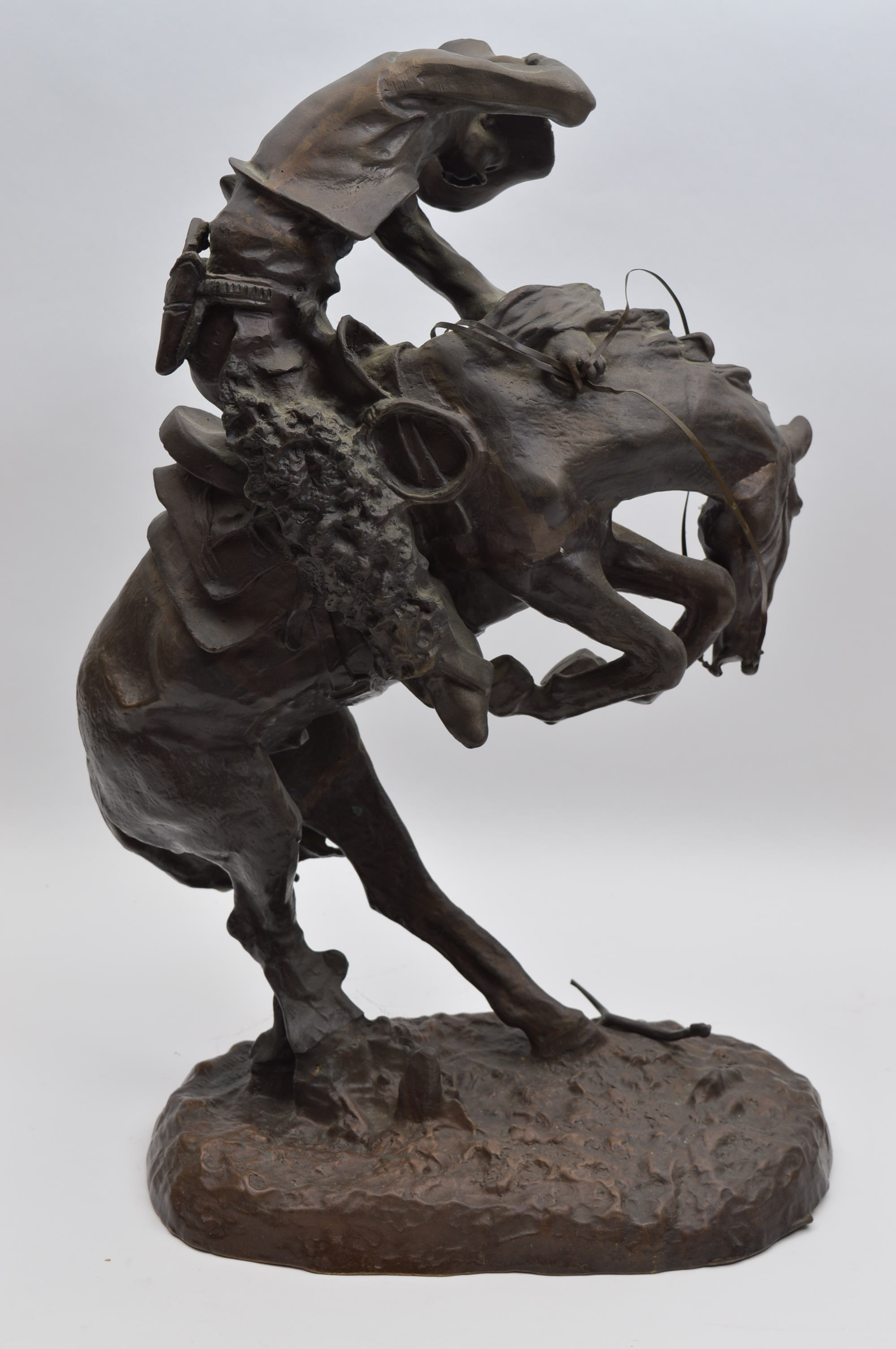 Bronze Cowboy Statue