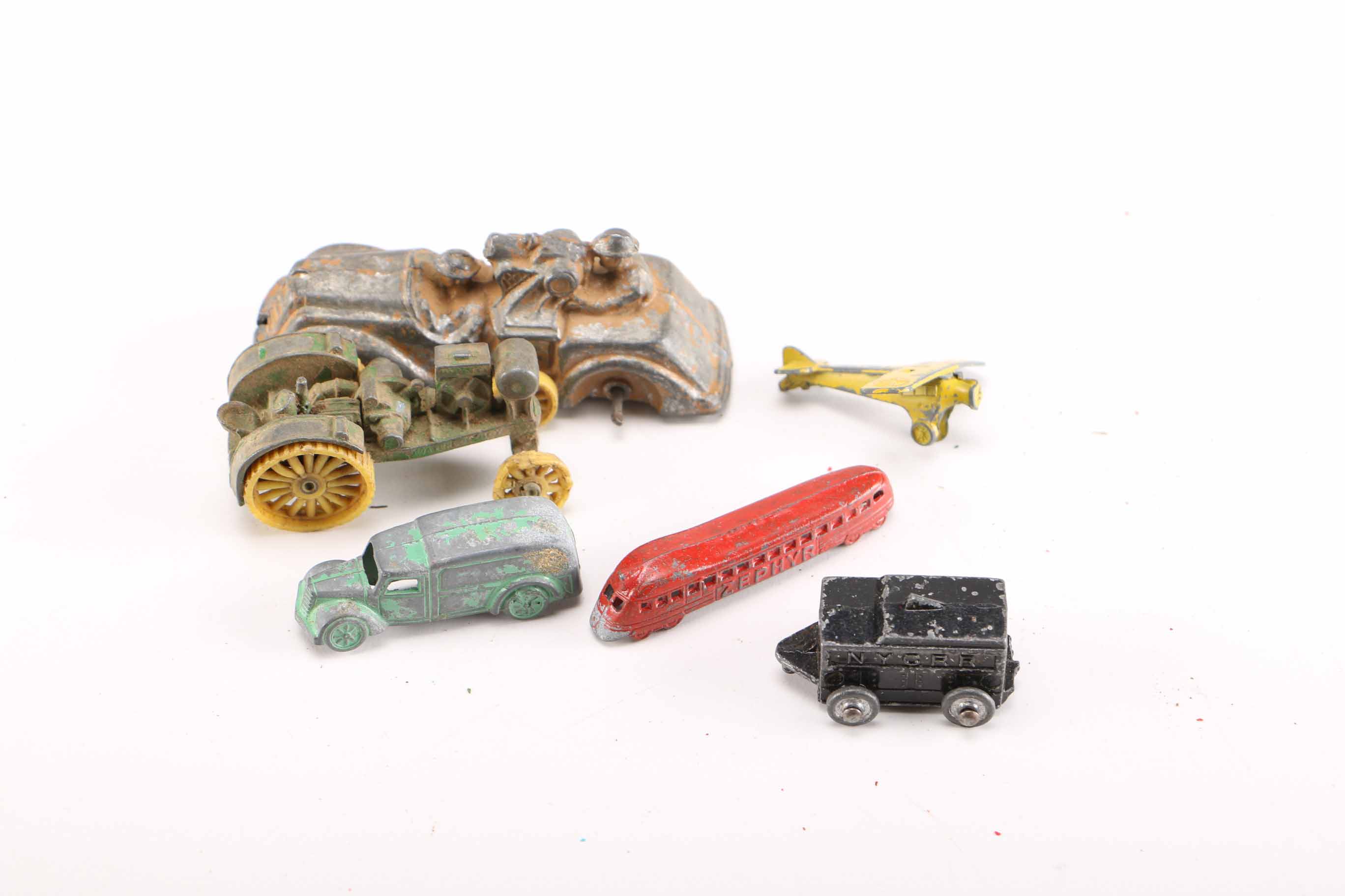 Vintage Cast Metal Toys Featuring 1930s Cracker Jack Prizes