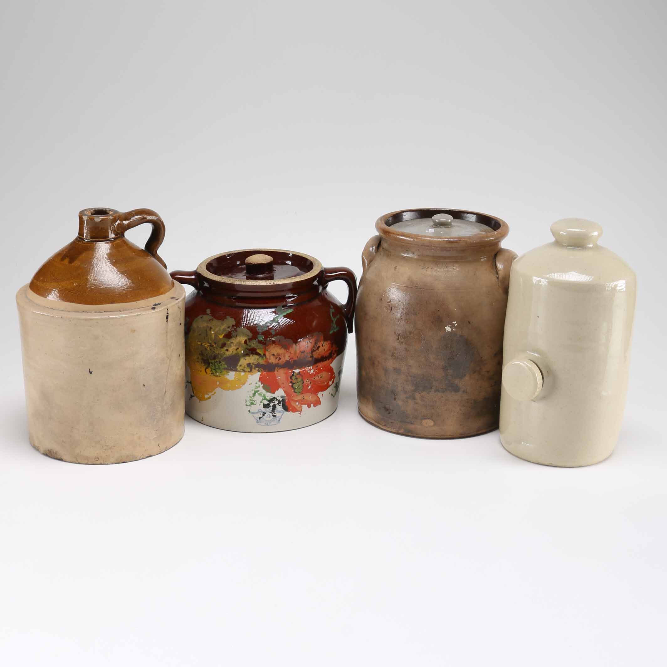 Group of Four Stoneware Jars