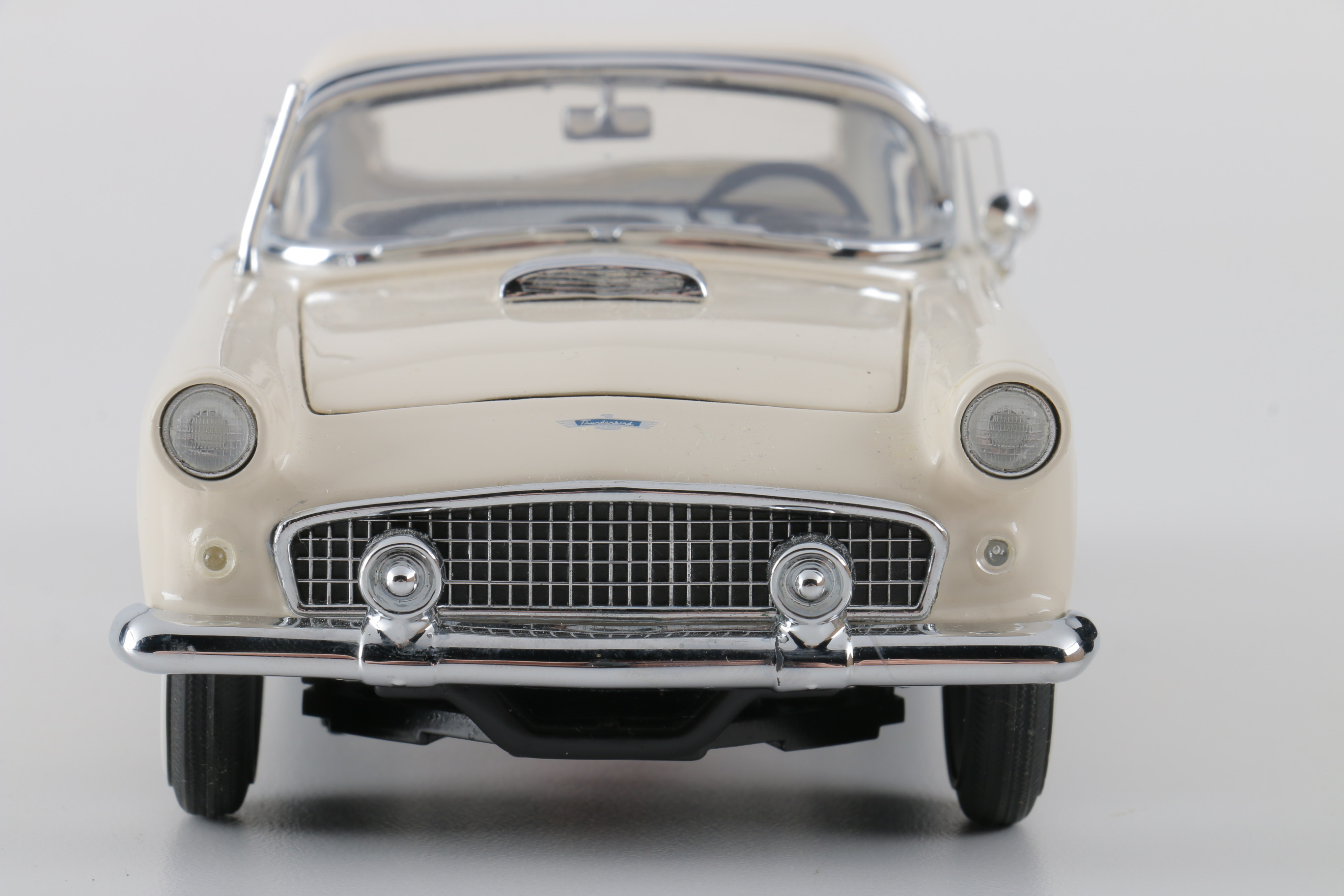 A collection of Four 1:24 Scale Ford Thunderbirds