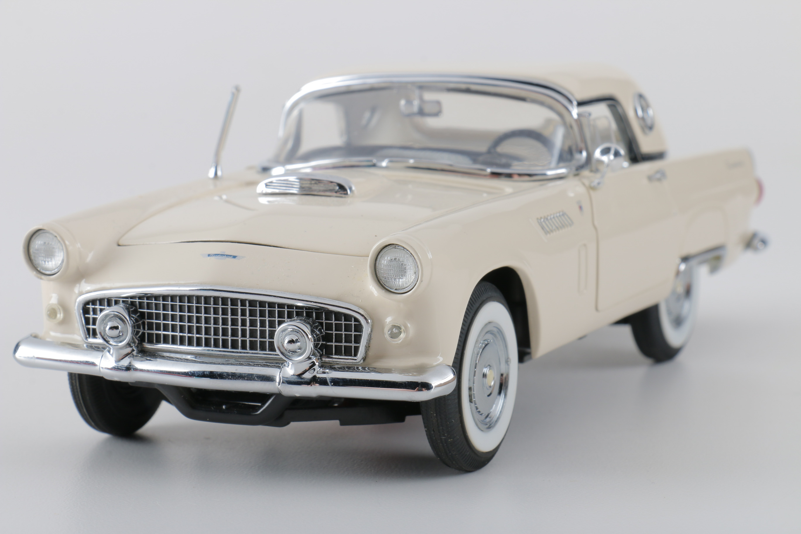 A collection of Four 1:24 Scale Ford Thunderbirds