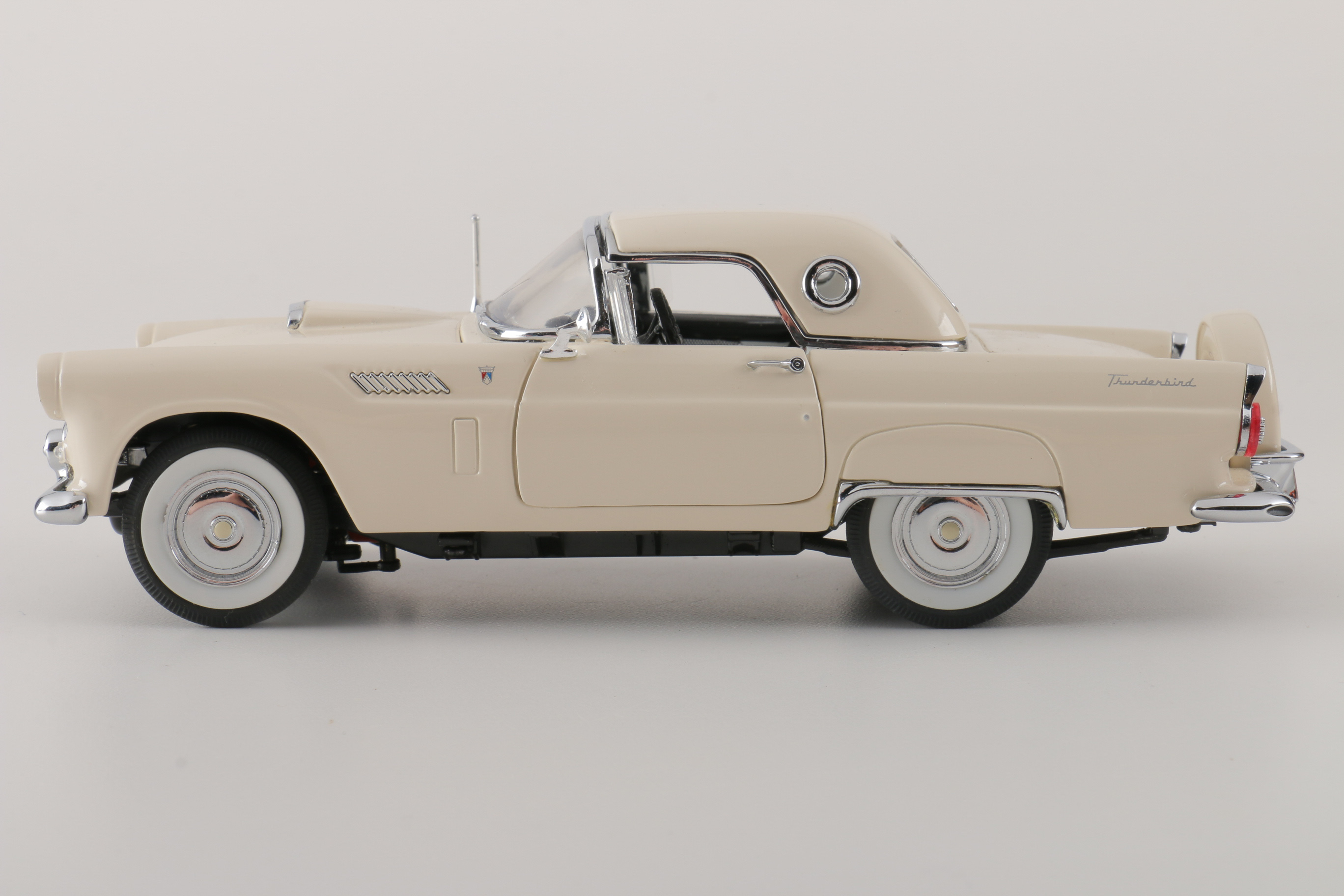 A collection of Four 1:24 Scale Ford Thunderbirds