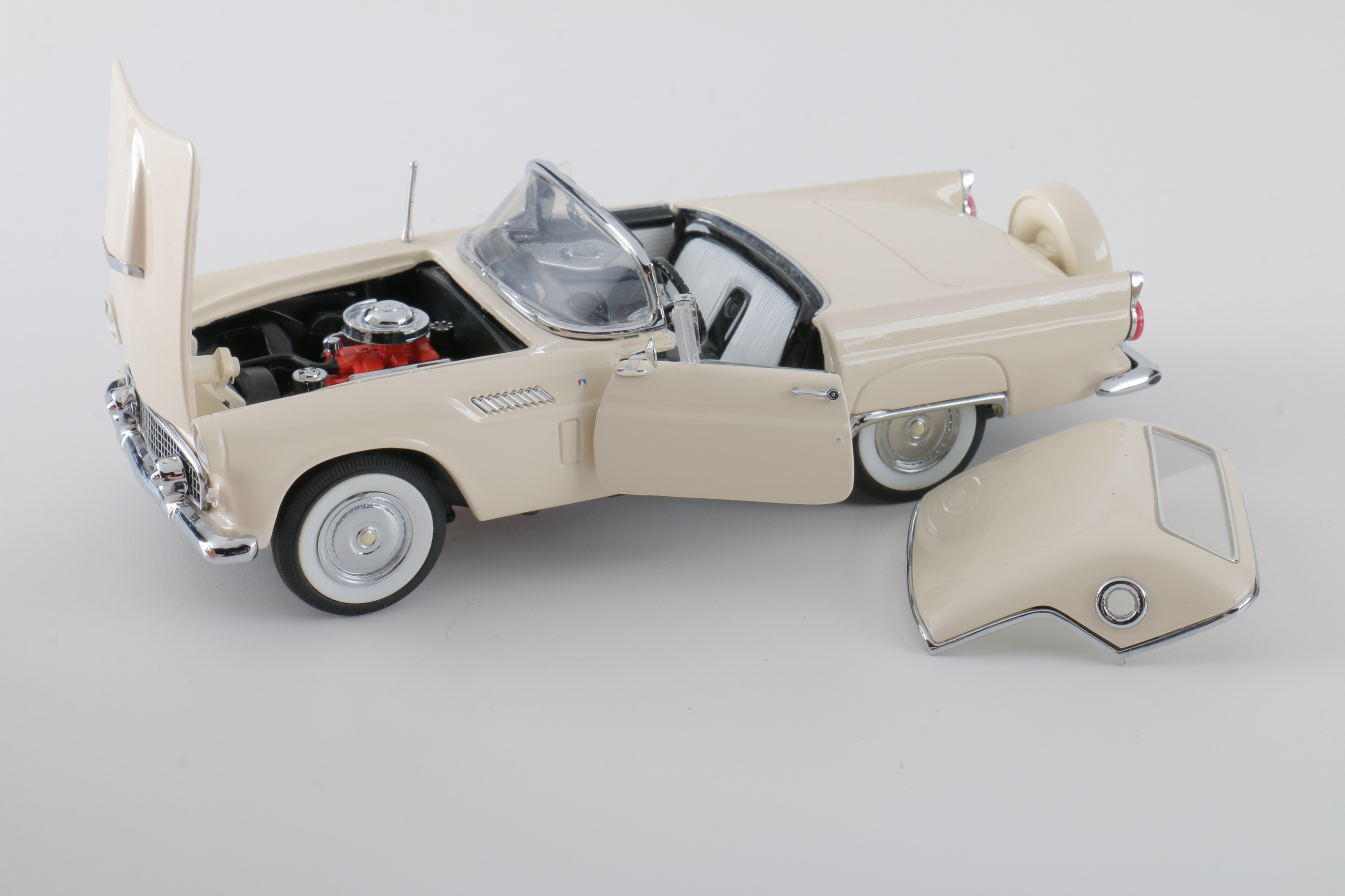 A collection of Four 1:24 Scale Ford Thunderbirds