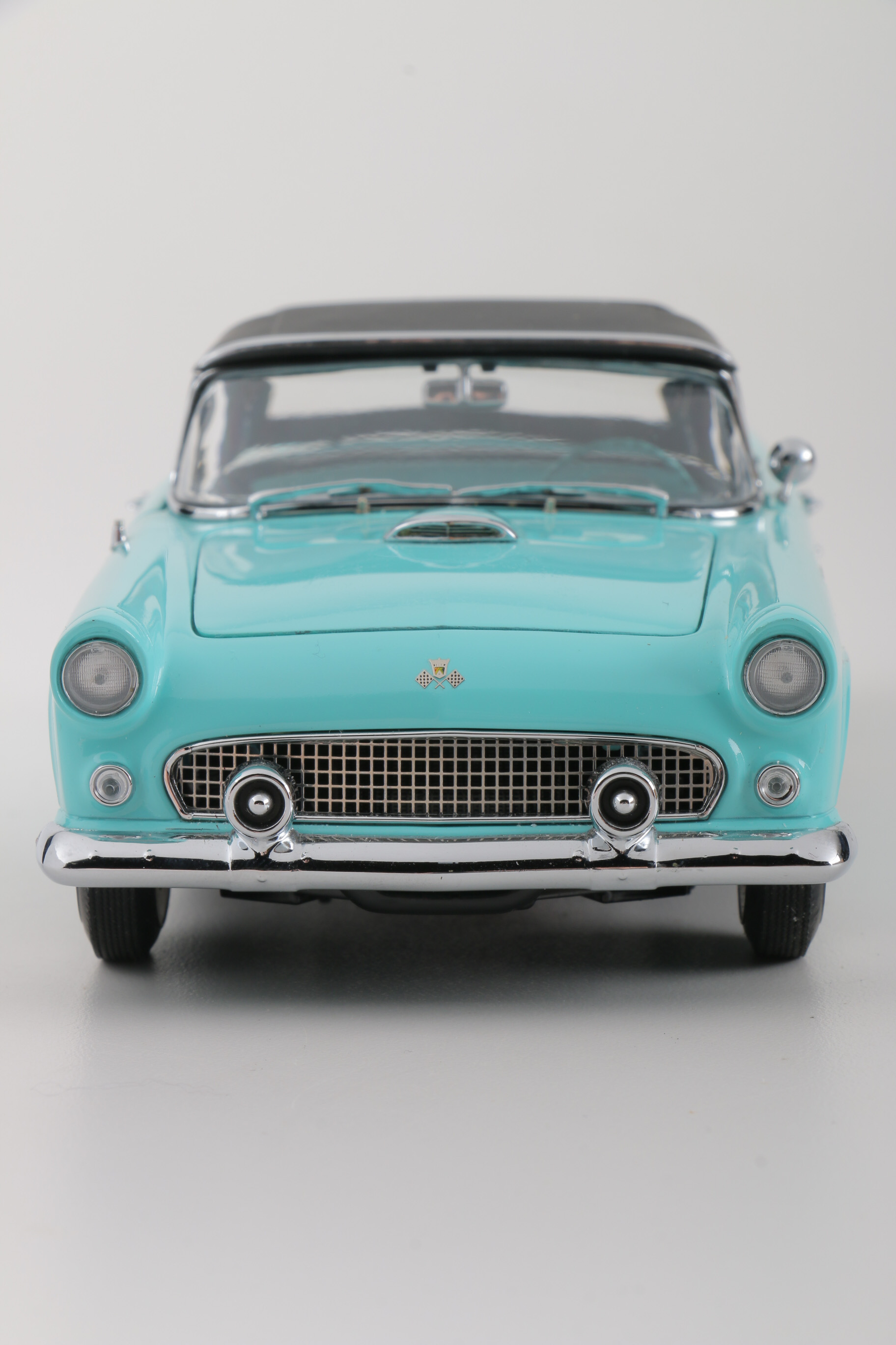 A collection of Four 1:24 Scale Ford Thunderbirds