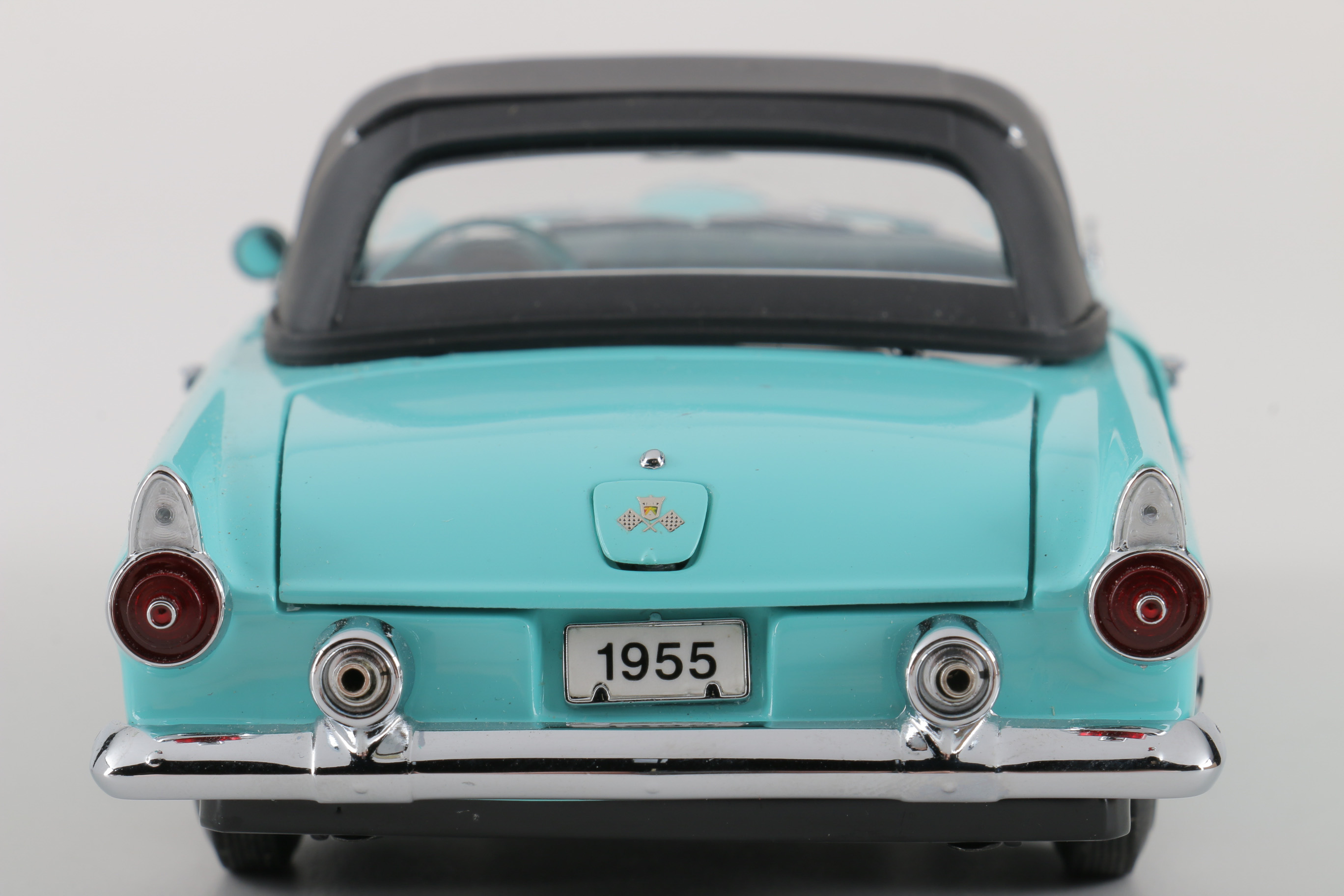 A collection of Four 1:24 Scale Ford Thunderbirds