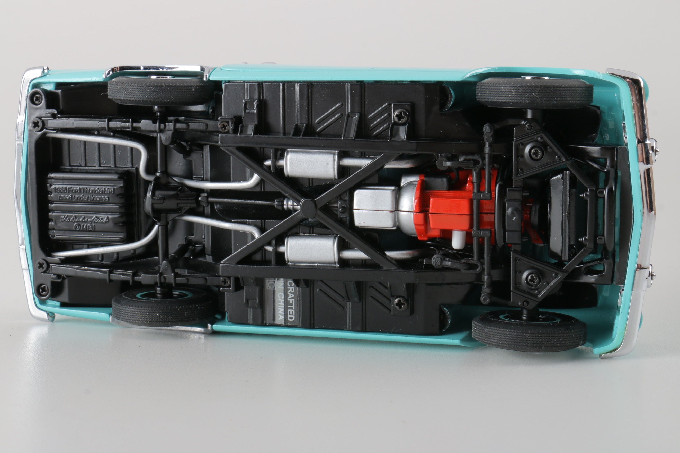 A collection of Four 1:24 Scale Ford Thunderbirds