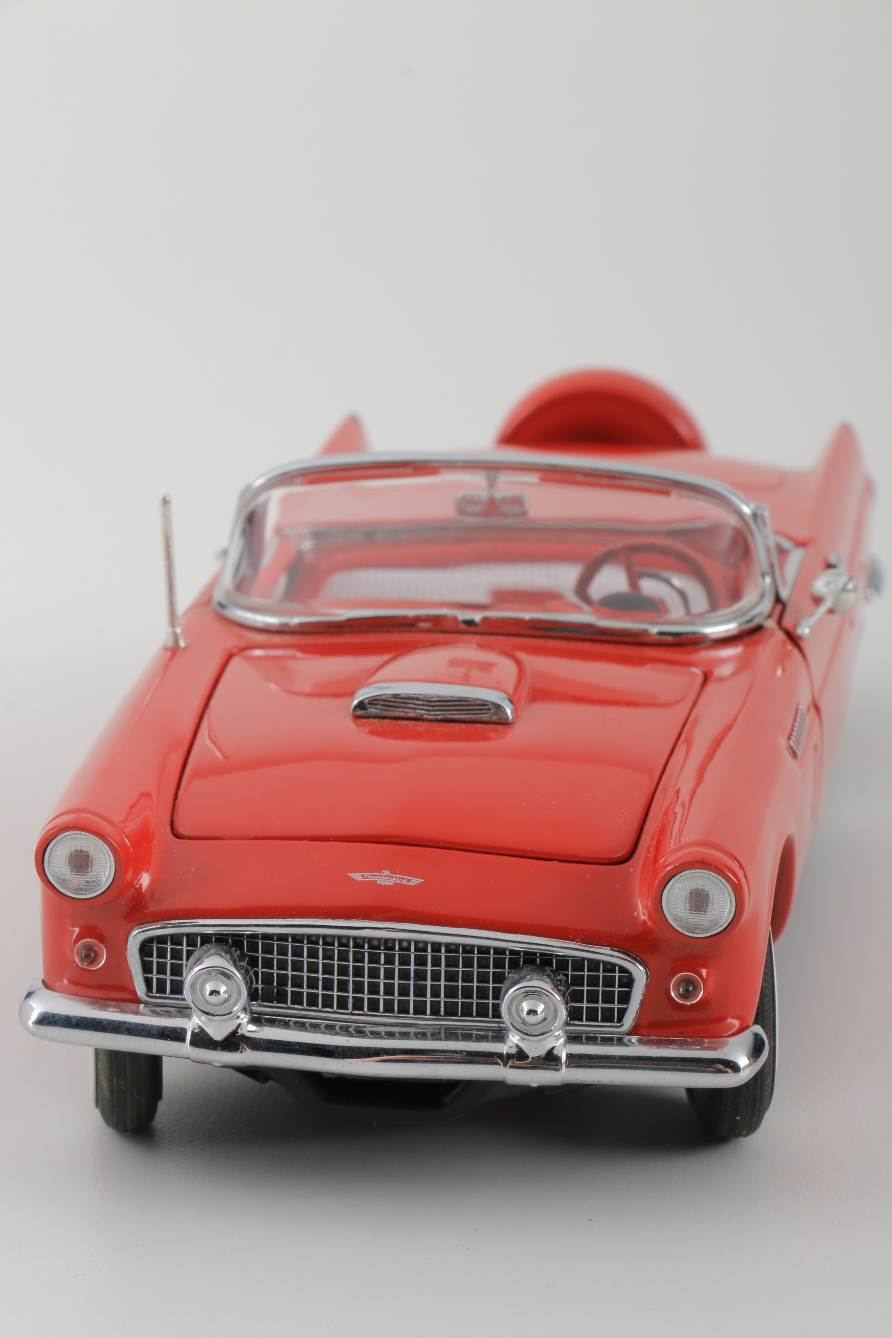 A collection of Four 1:24 Scale Ford Thunderbirds