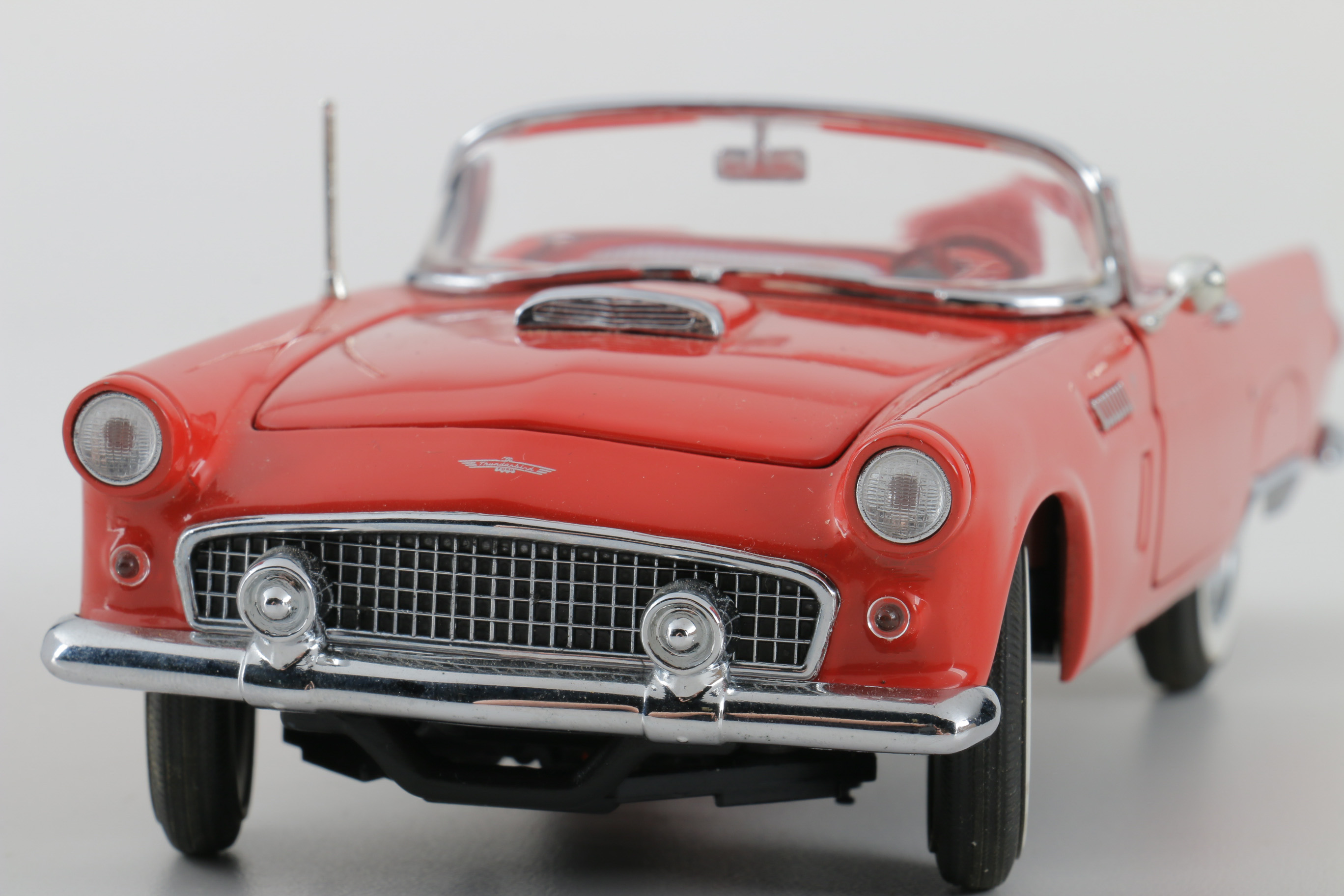 A collection of Four 1:24 Scale Ford Thunderbirds