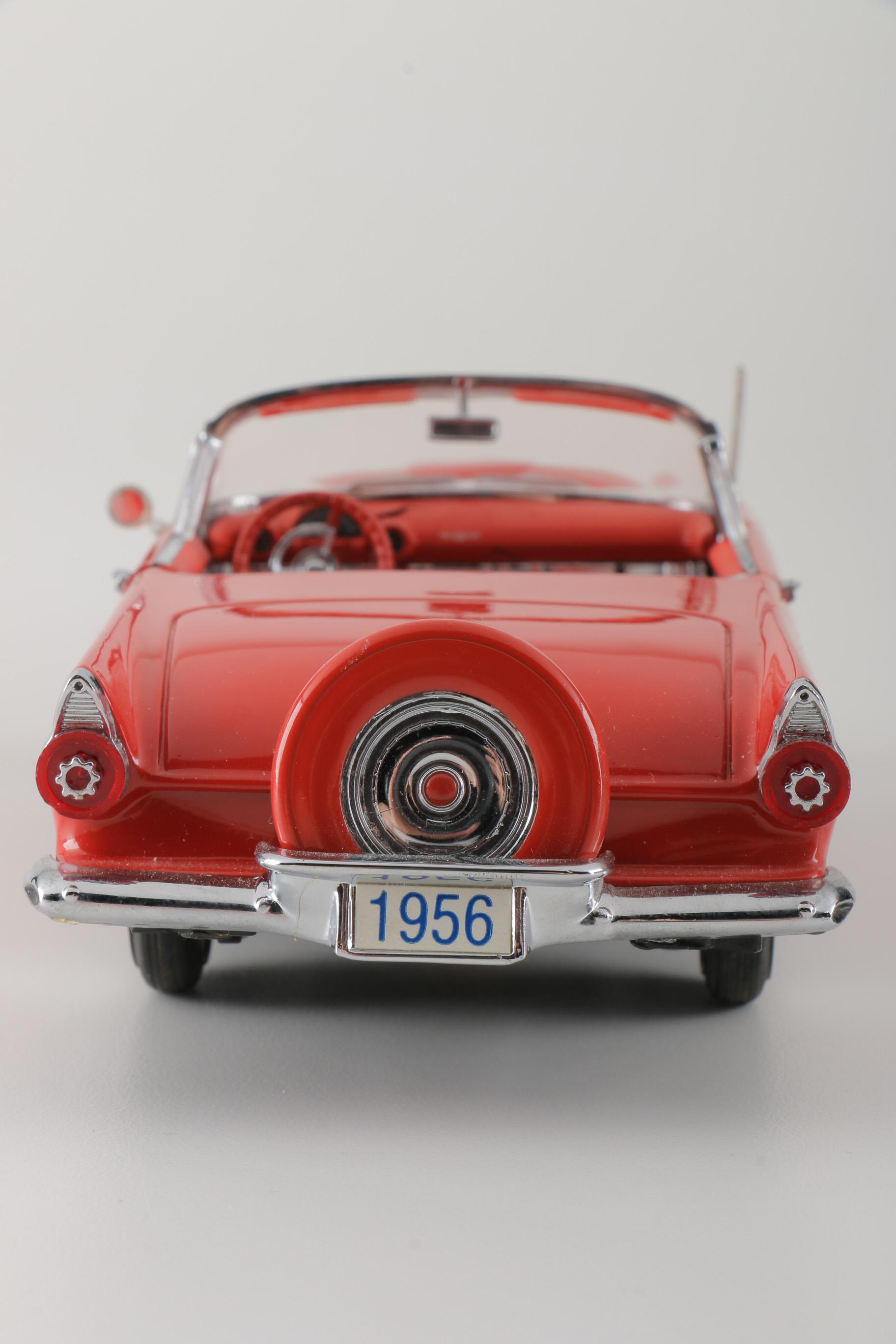 A collection of Four 1:24 Scale Ford Thunderbirds