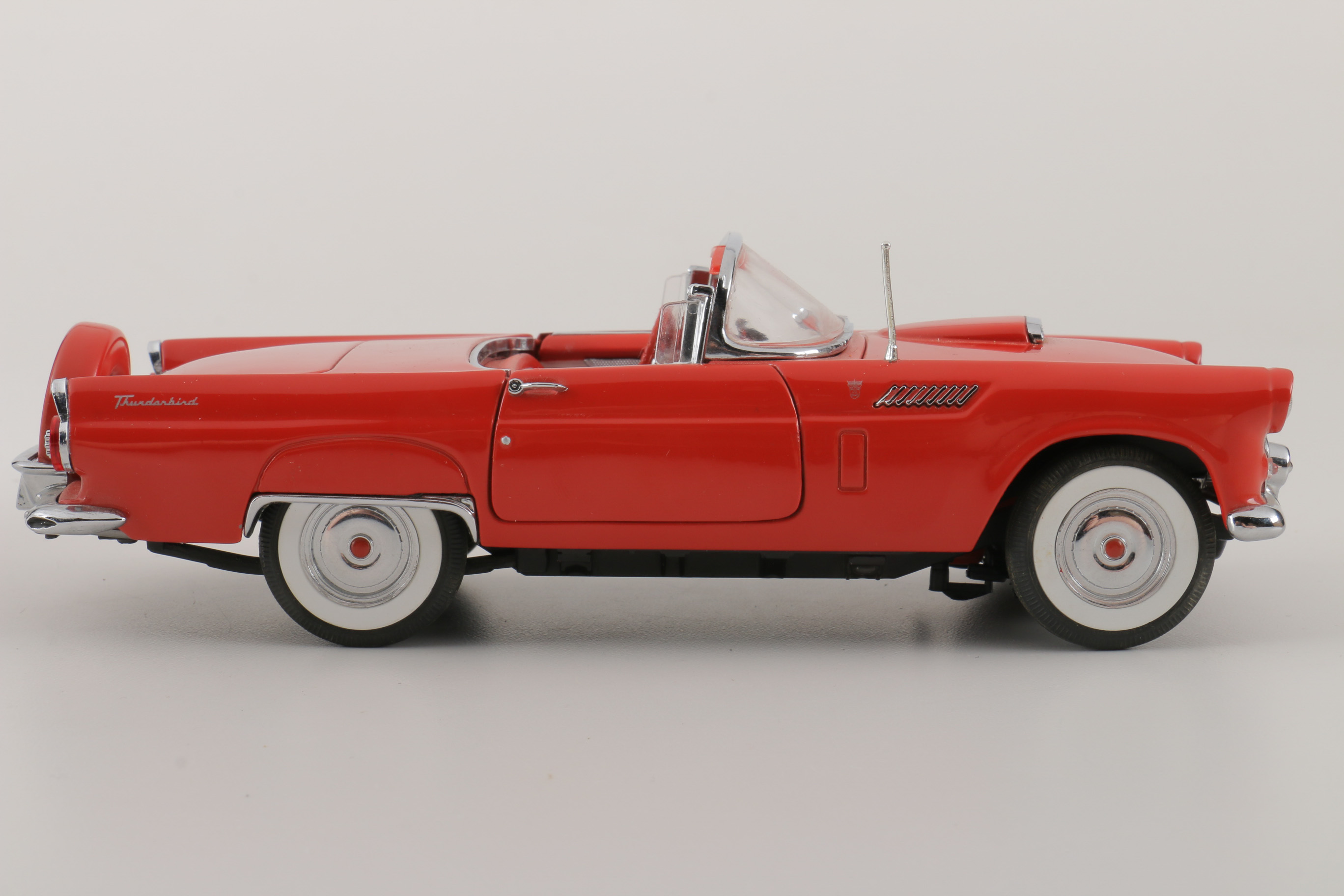 A collection of Four 1:24 Scale Ford Thunderbirds