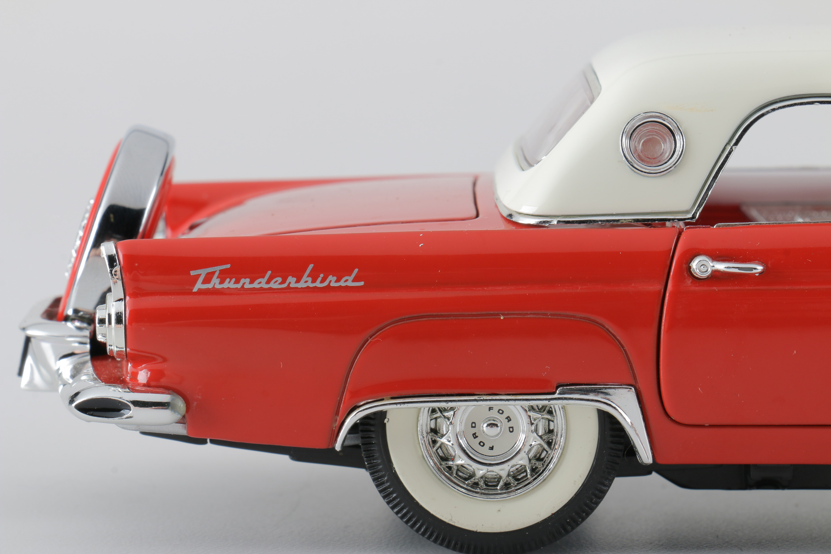 A collection of Four 1:24 Scale Ford Thunderbirds