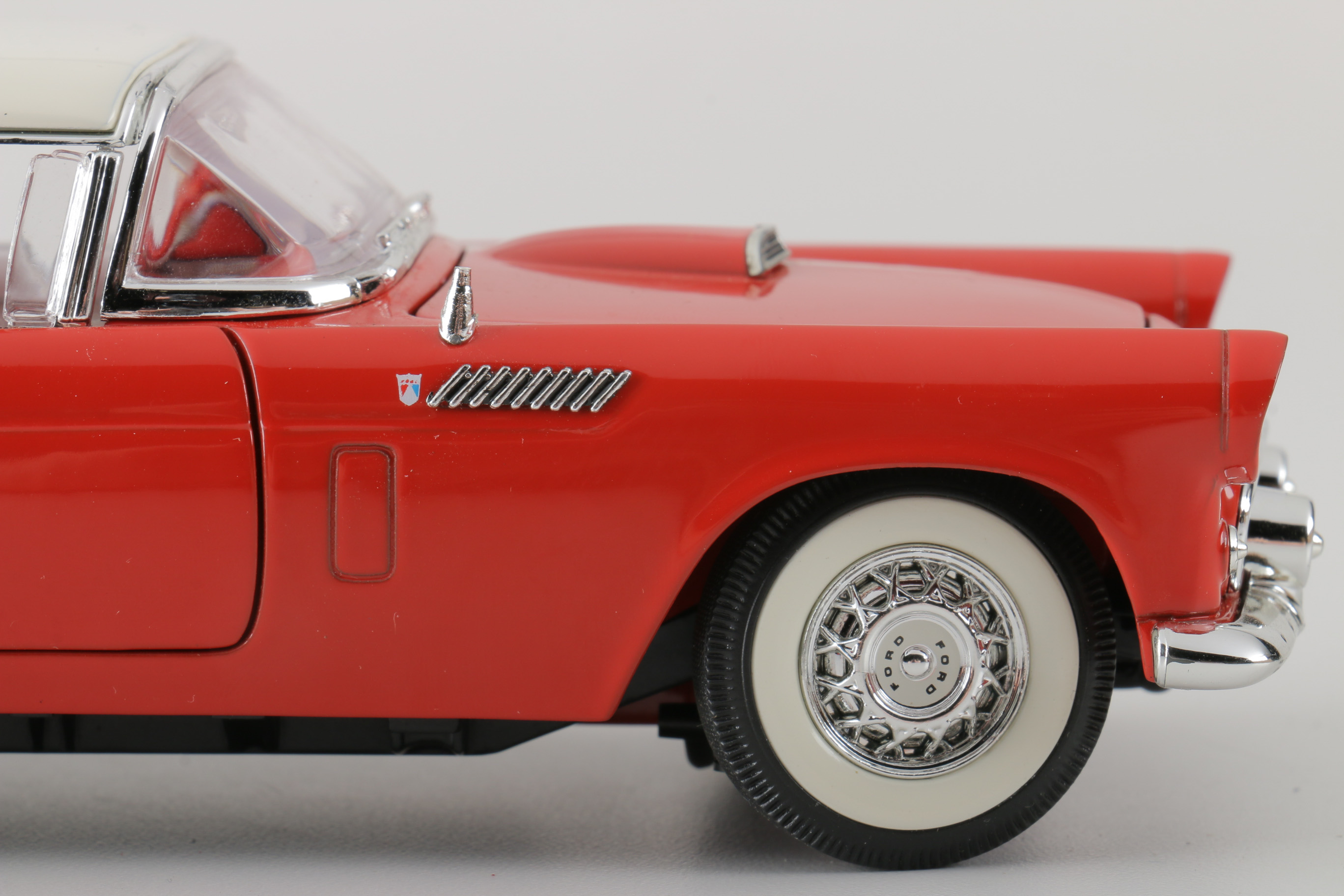 A collection of Four 1:24 Scale Ford Thunderbirds