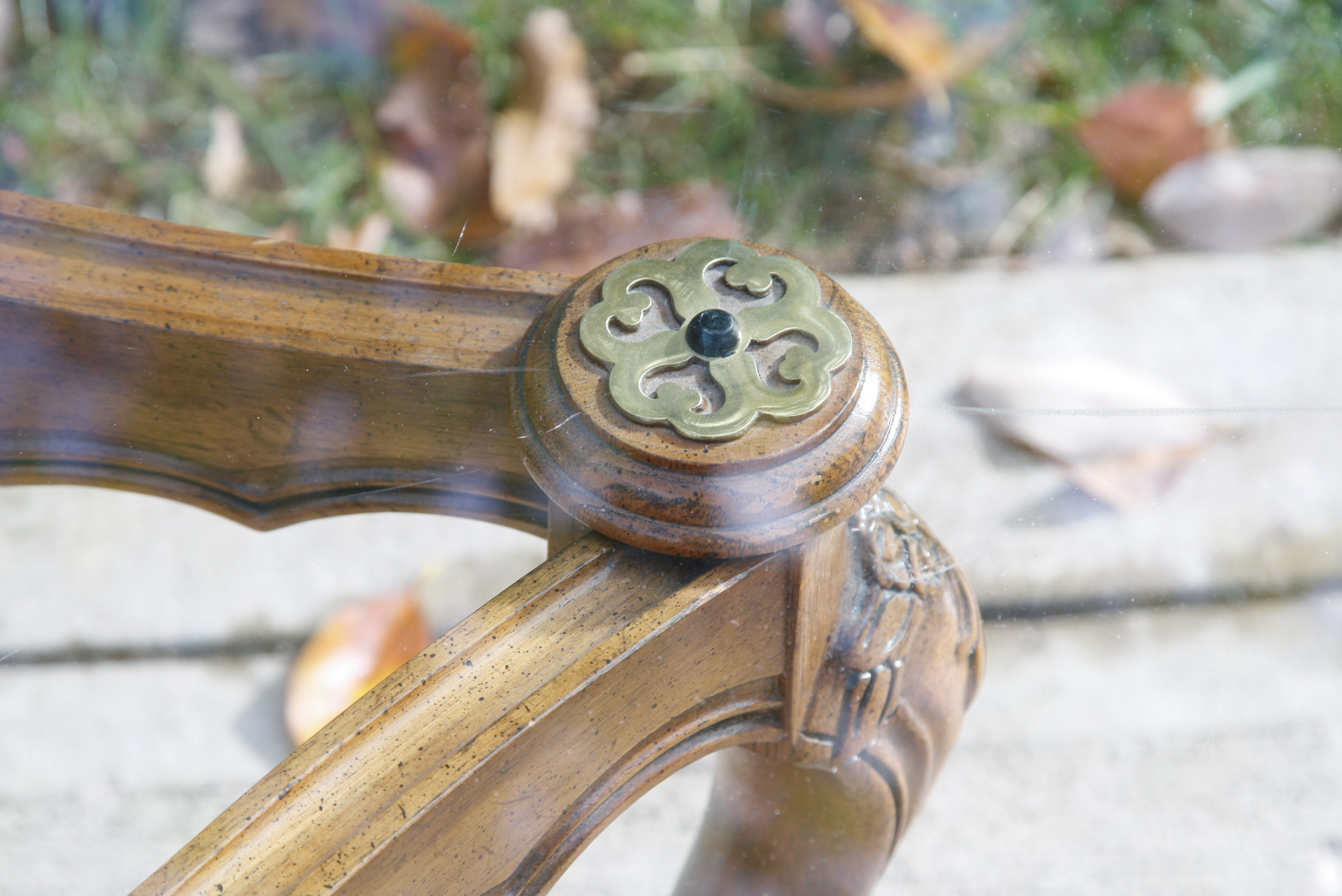 Oval Glass Top Coffee Table with Carved Wood Base