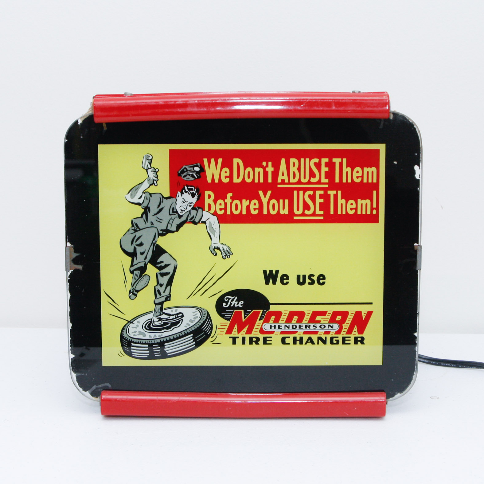 Henderson Tire Advertising Sign