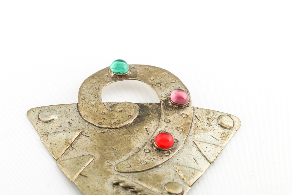 Collection of Metal Bracelets and a Pin