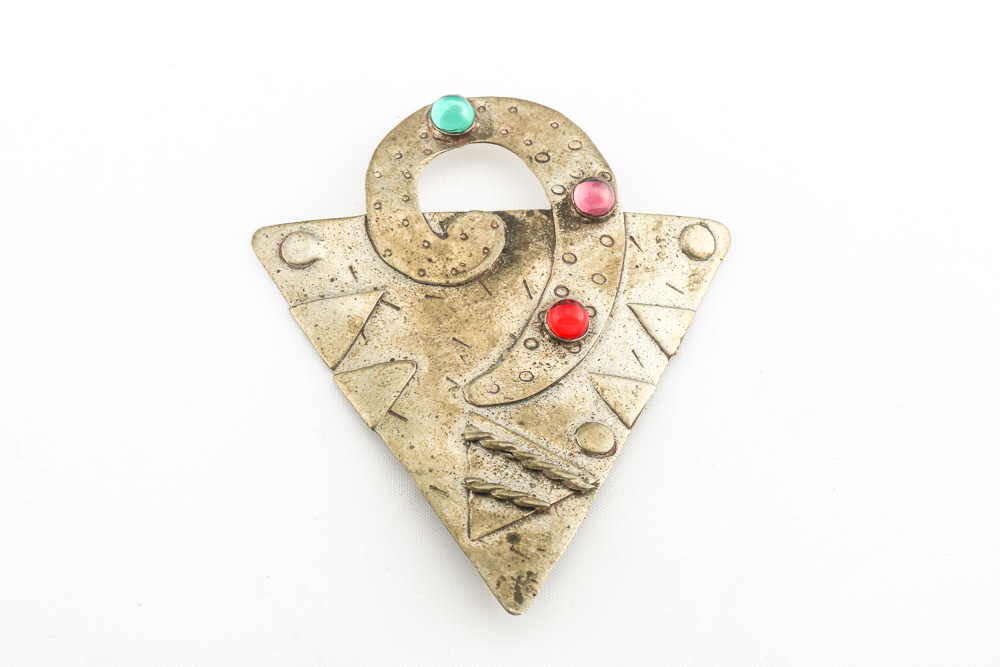 Collection of Metal Bracelets and a Pin