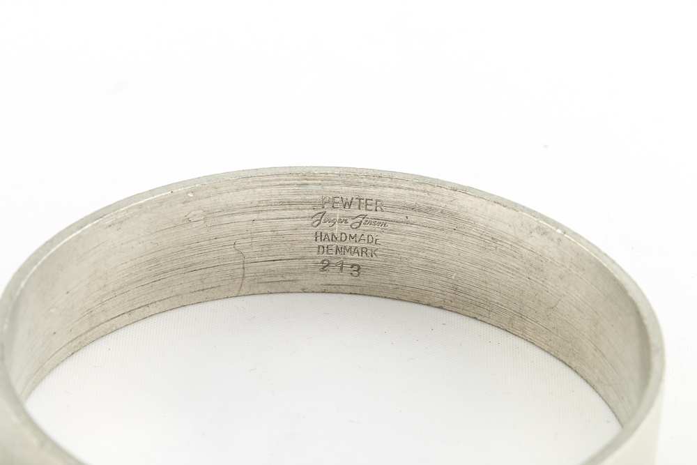 Collection of Metal Bracelets and a Pin