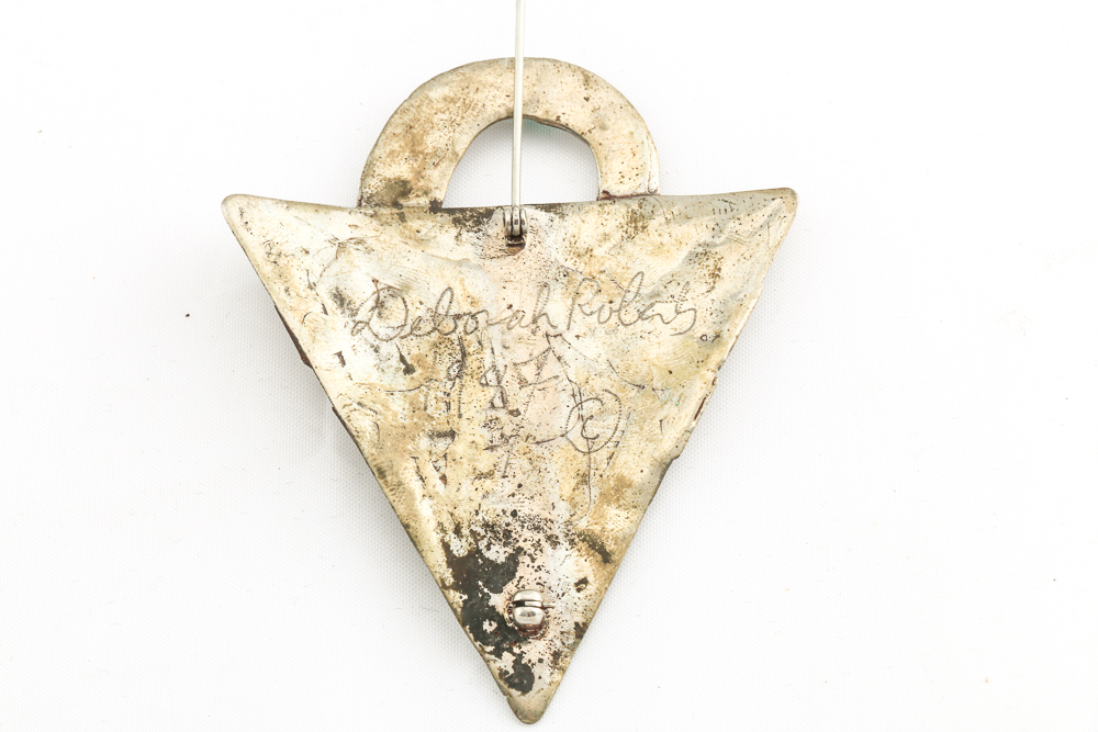 Collection of Metal Bracelets and a Pin