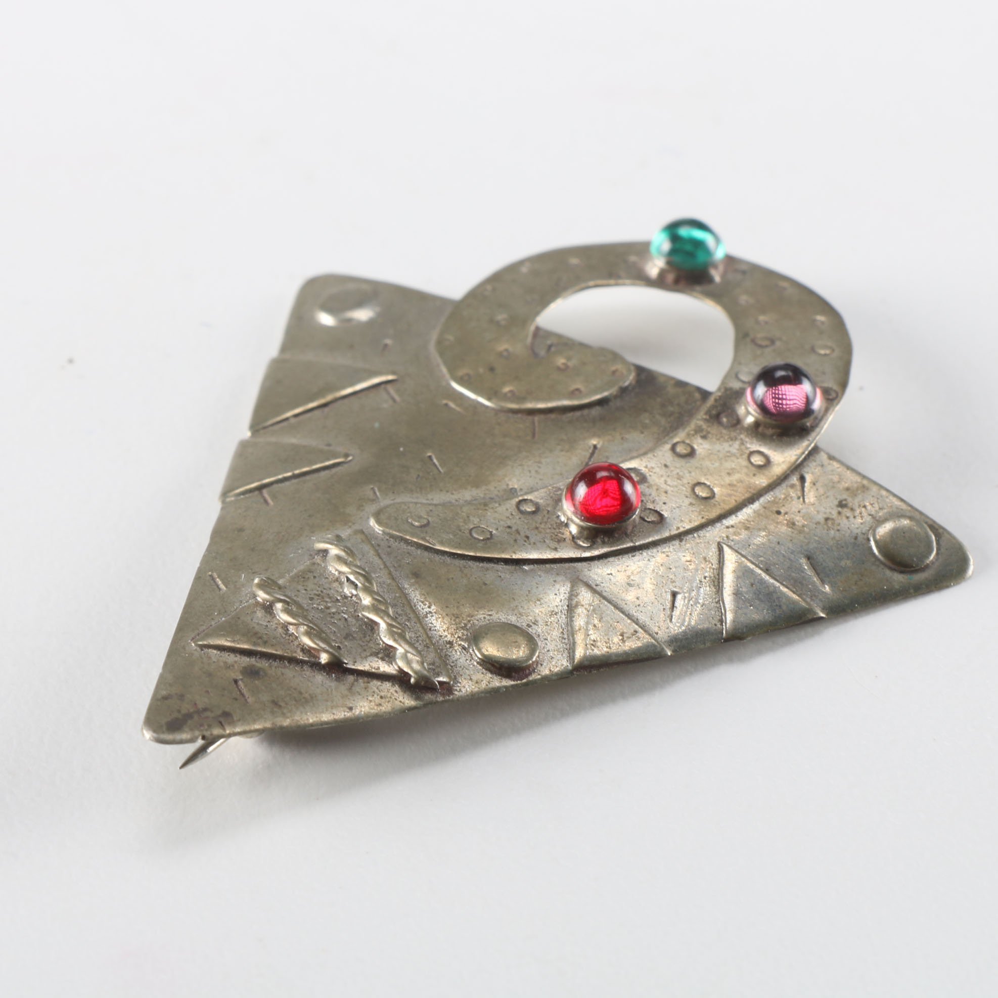 Collection of Metal Bracelets and a Pin