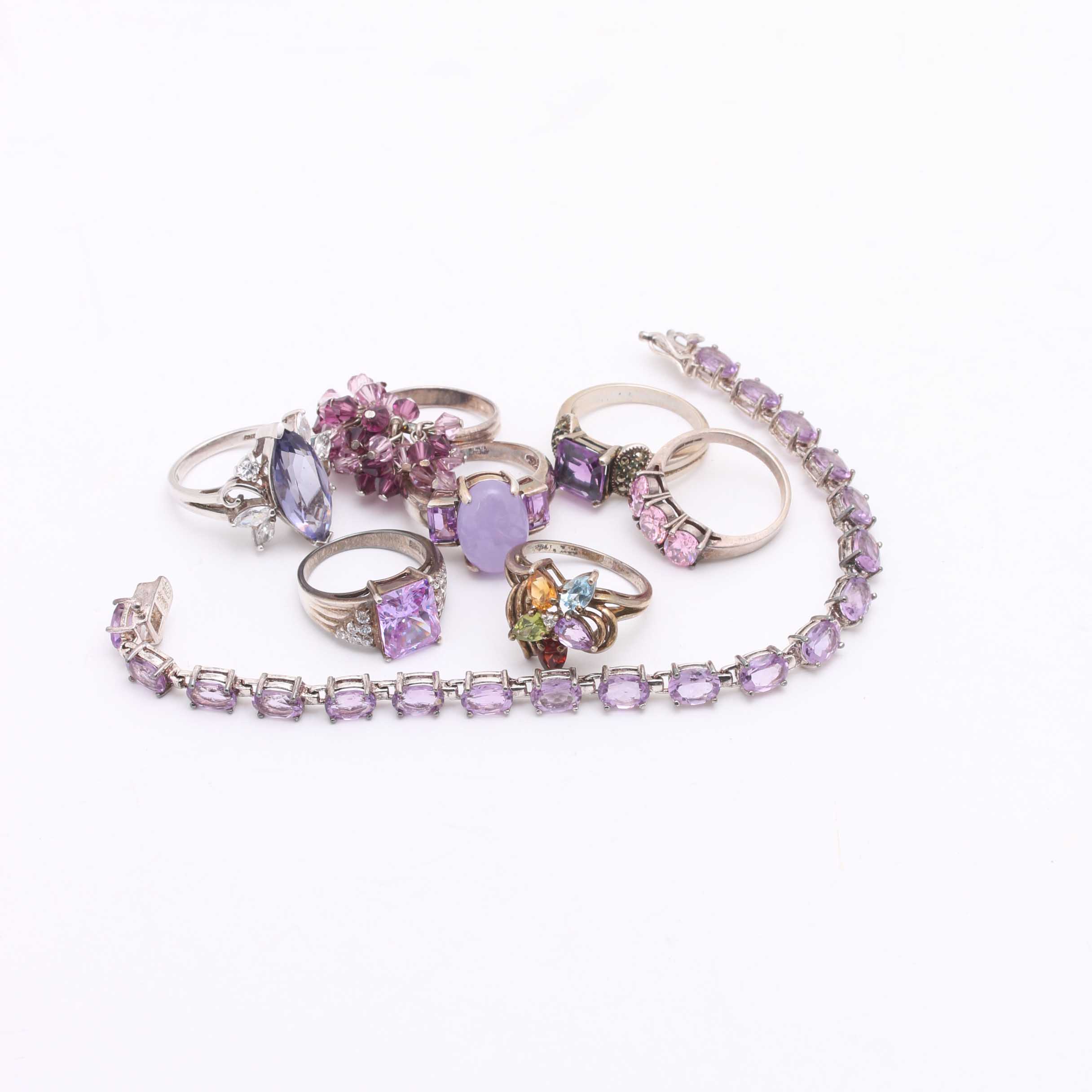 Collection of Sterling Silver and Purple Toned Stones