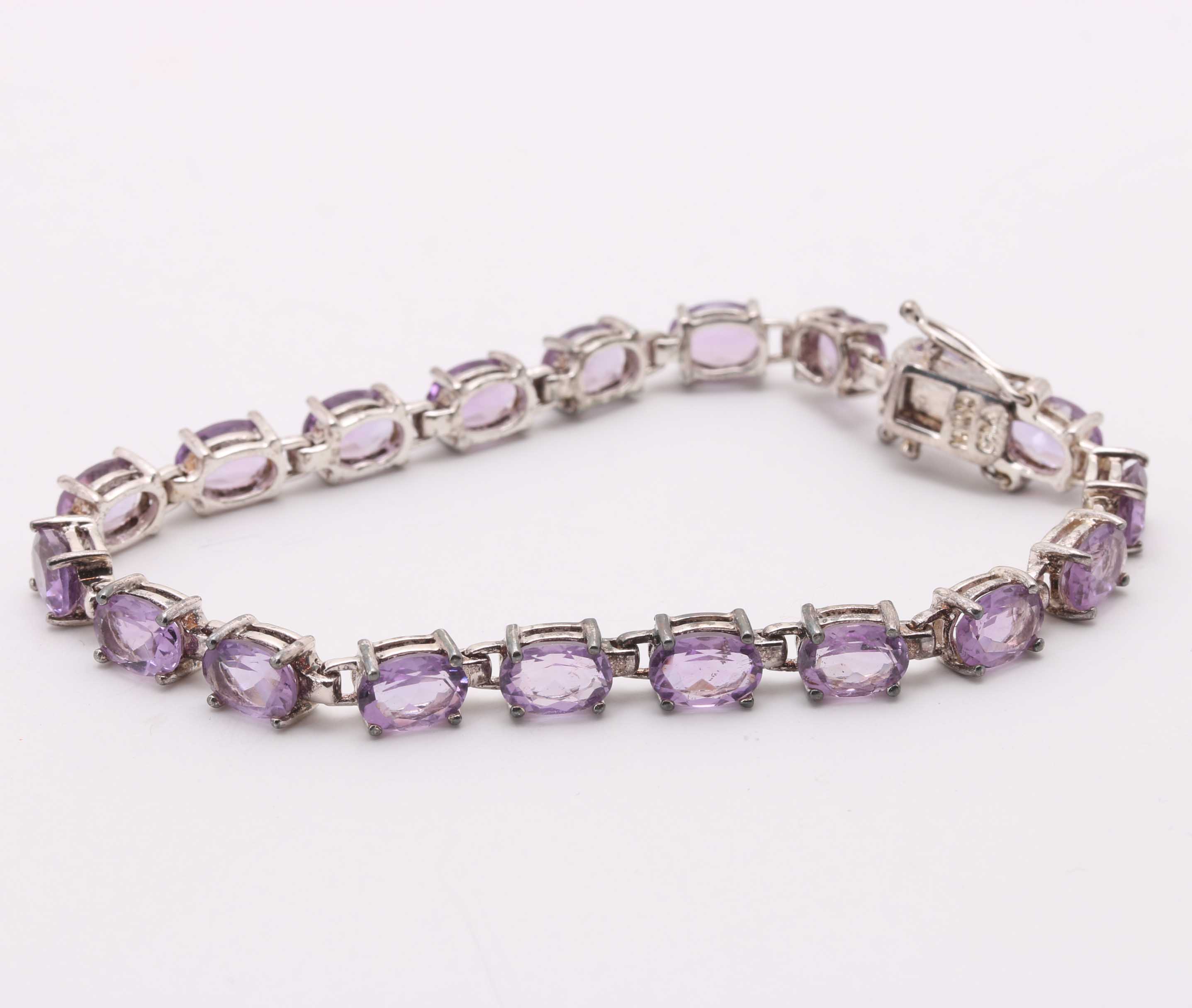 Collection of Sterling Silver and Purple Toned Stones