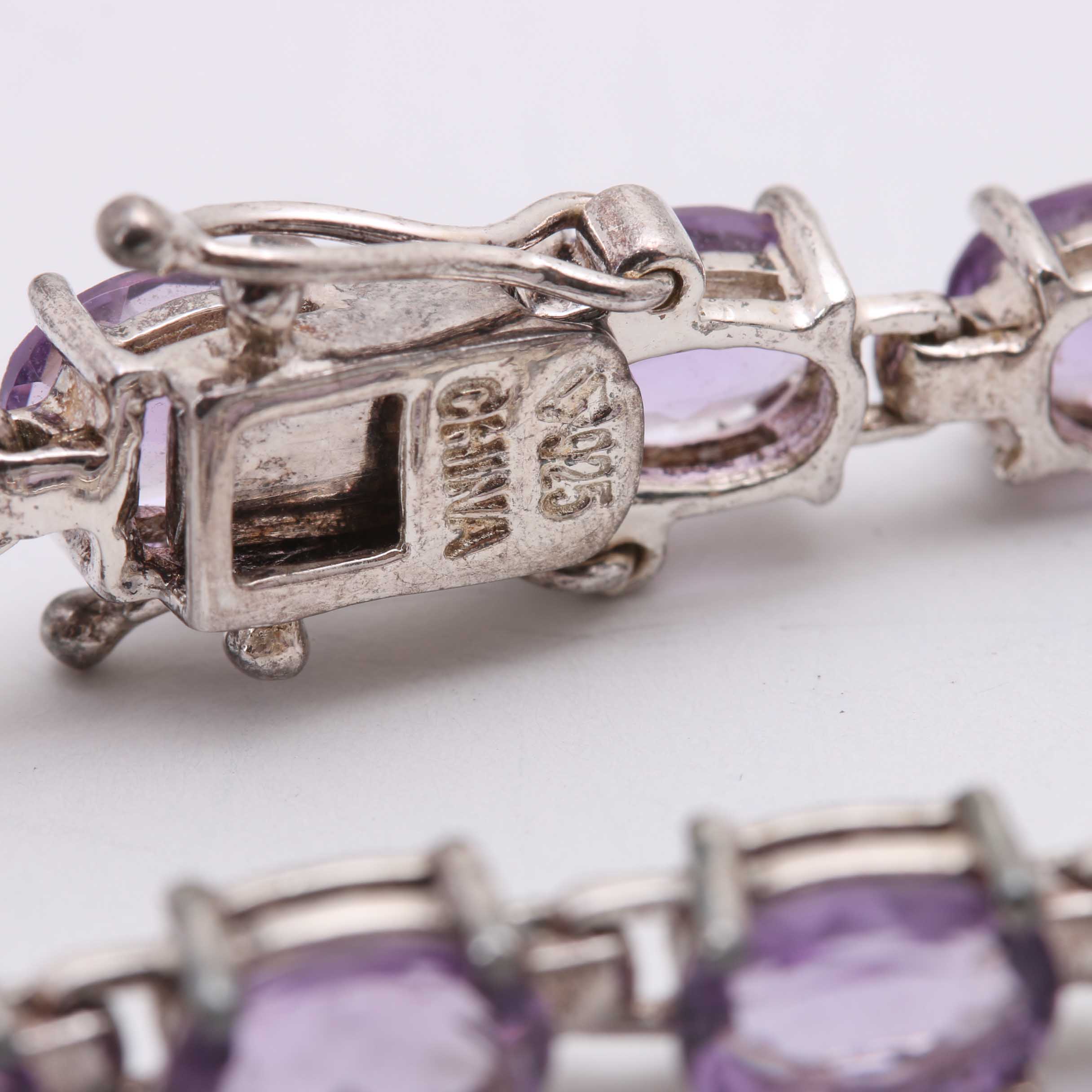 Collection of Sterling Silver and Purple Toned Stones