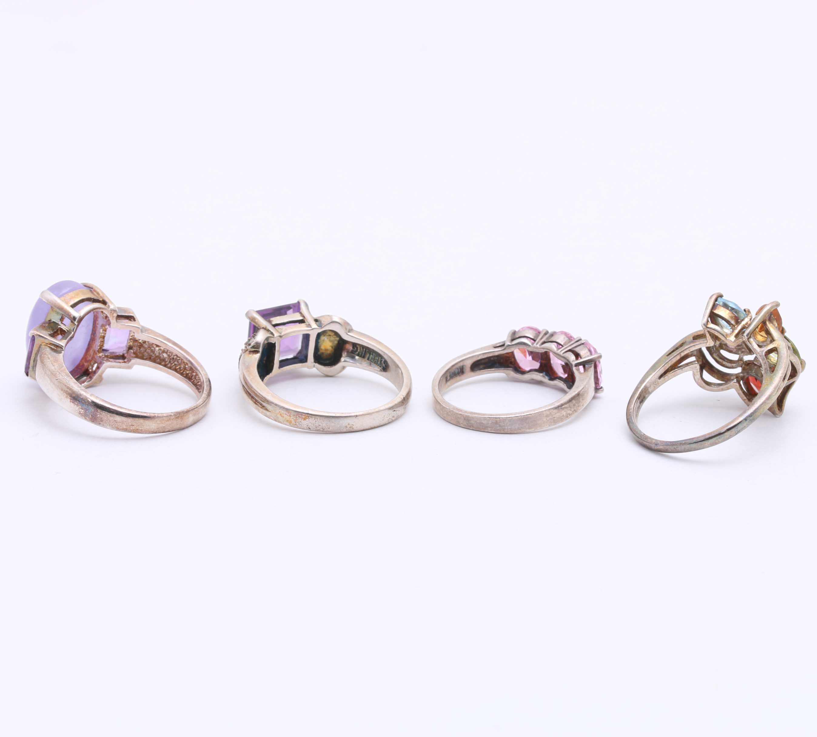 Collection of Sterling Silver and Purple Toned Stones